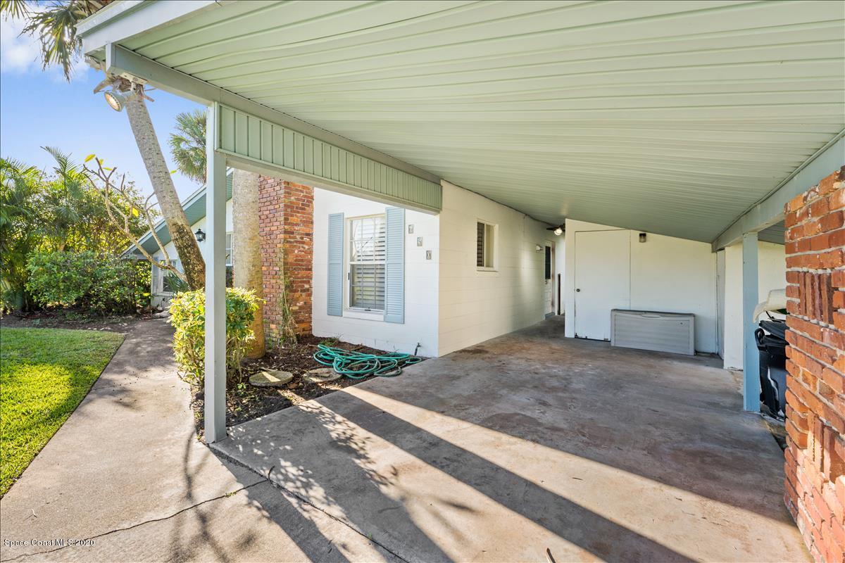 650 Java Road Cocoa Beach, FL 32931 - Photo 16 of 39 a view of a house with a patio