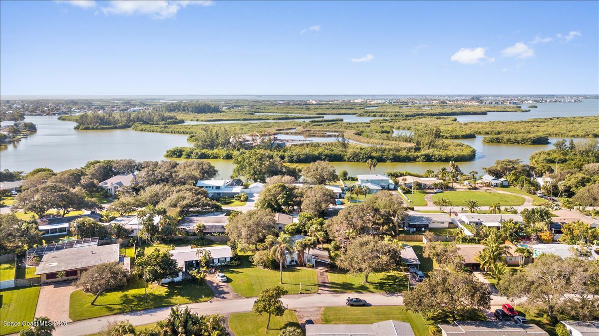 650 Java Road Cocoa Beach, FL 32931 - Photo 5 of 39 an aerial view of residential building and lake