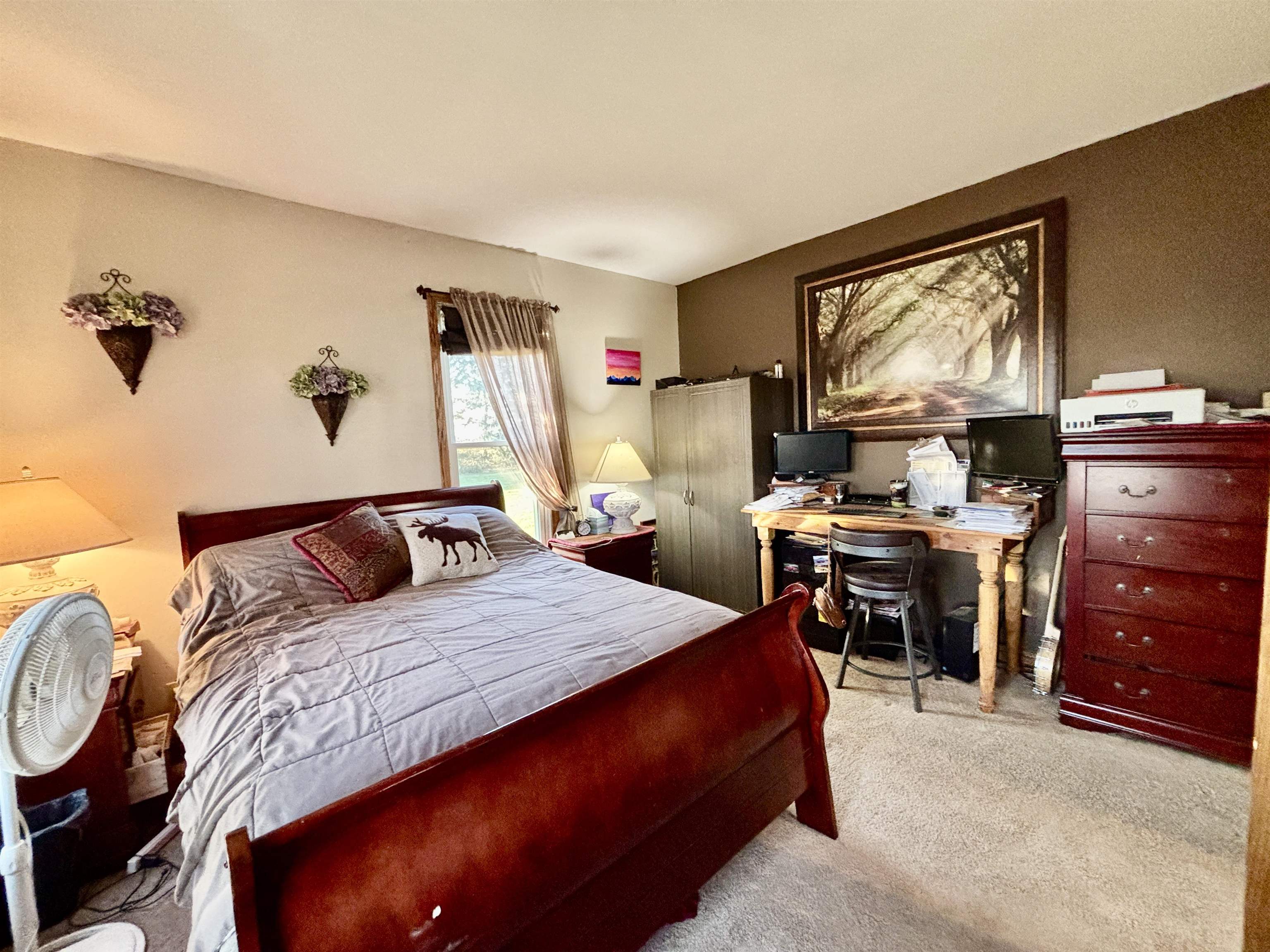 12916 Grange Hall Road Capron, IL 61012 - Photo 14 of 48 a bedroom with a bed and a flat screen tv