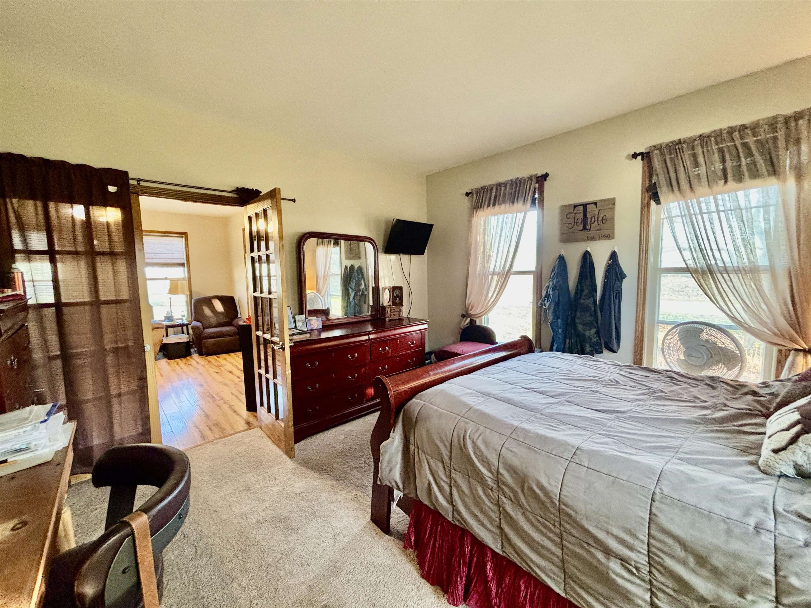 12916 Grange Hall Road Capron, IL 61012 - Photo 16 of 48 a bedroom with a bed and wooden floor