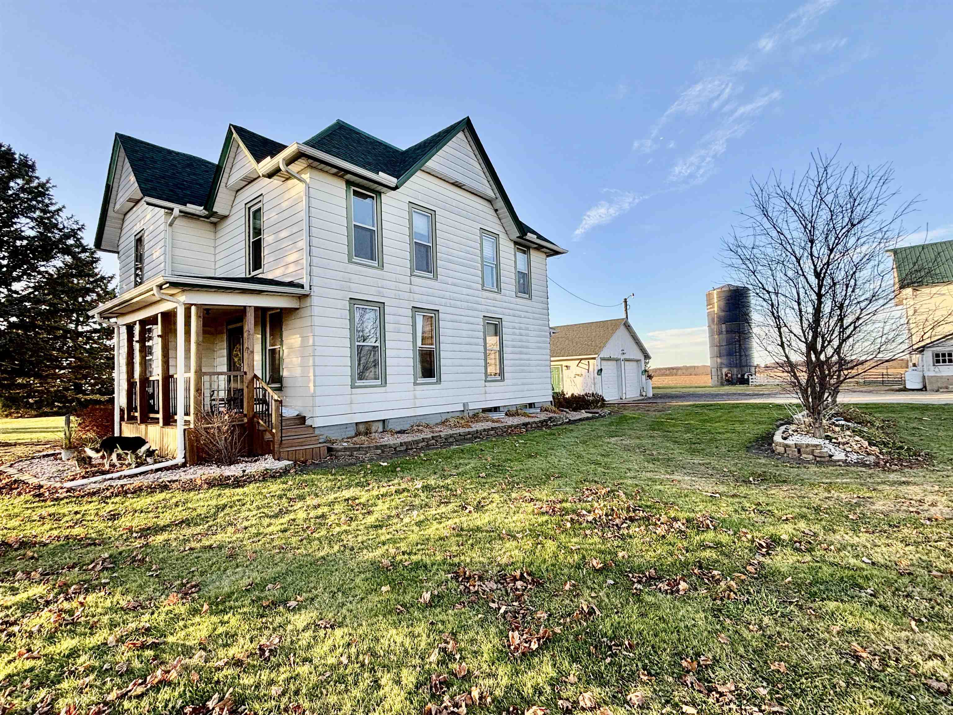 12916 Grange Hall Road Capron, IL 61012 - Photo 2 of 48 a view of a house with a yard