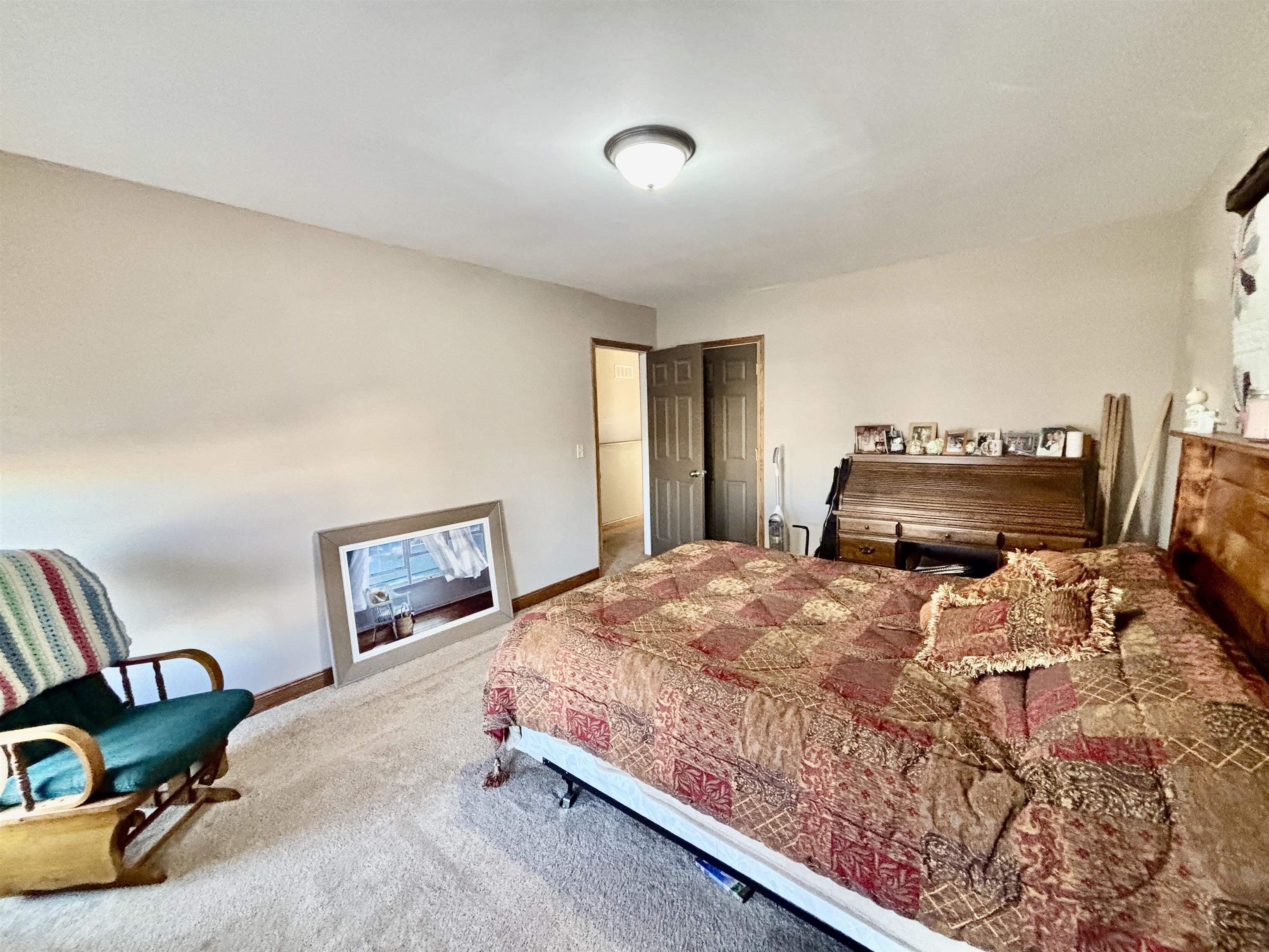 12916 Grange Hall Road Capron, IL 61012 - Photo 24 of 48 a bedroom with a bed and a tv