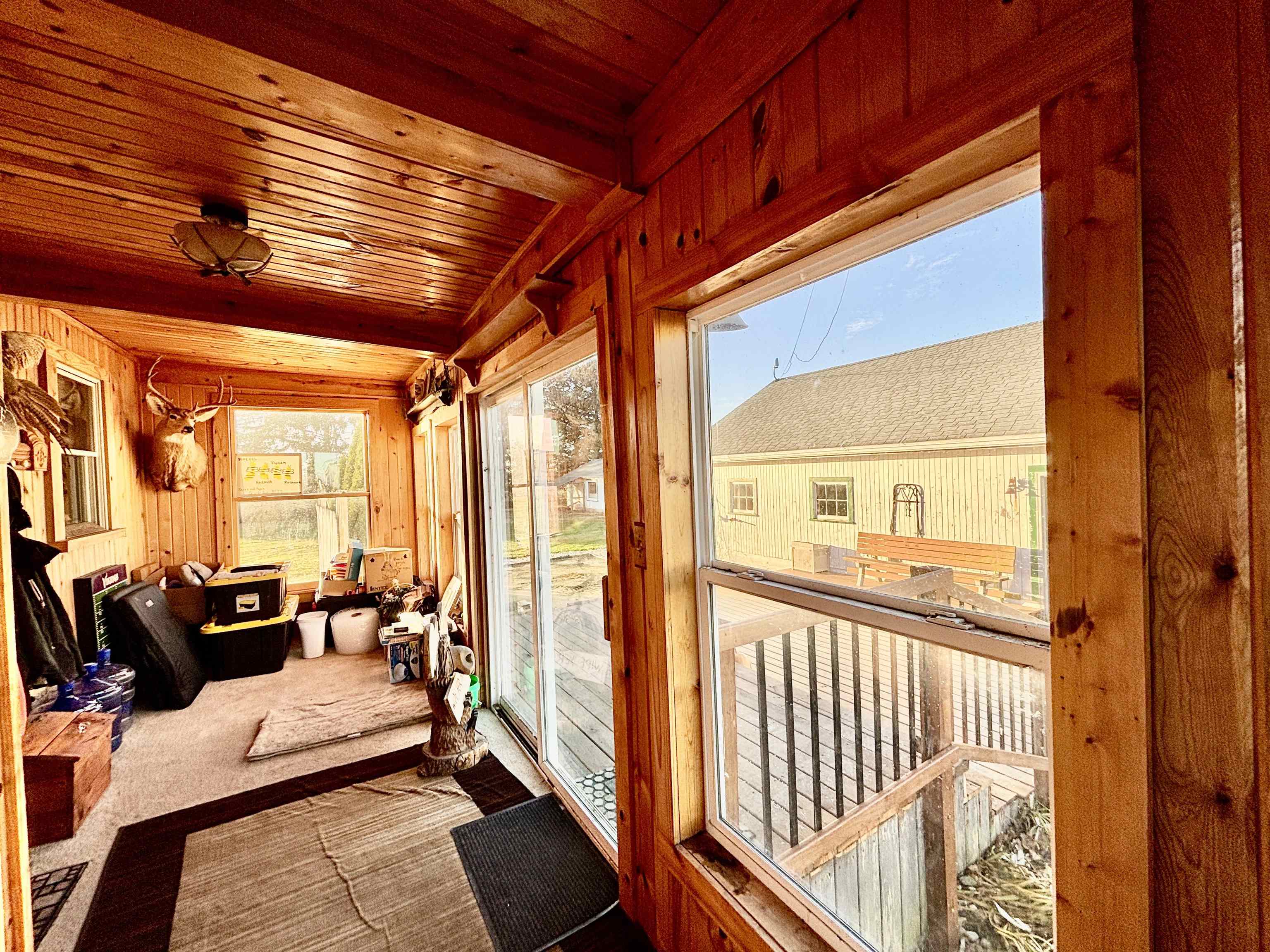 12916 Grange Hall Road Capron, IL 61012 - Photo 28 of 48 a view of a balcony with couch