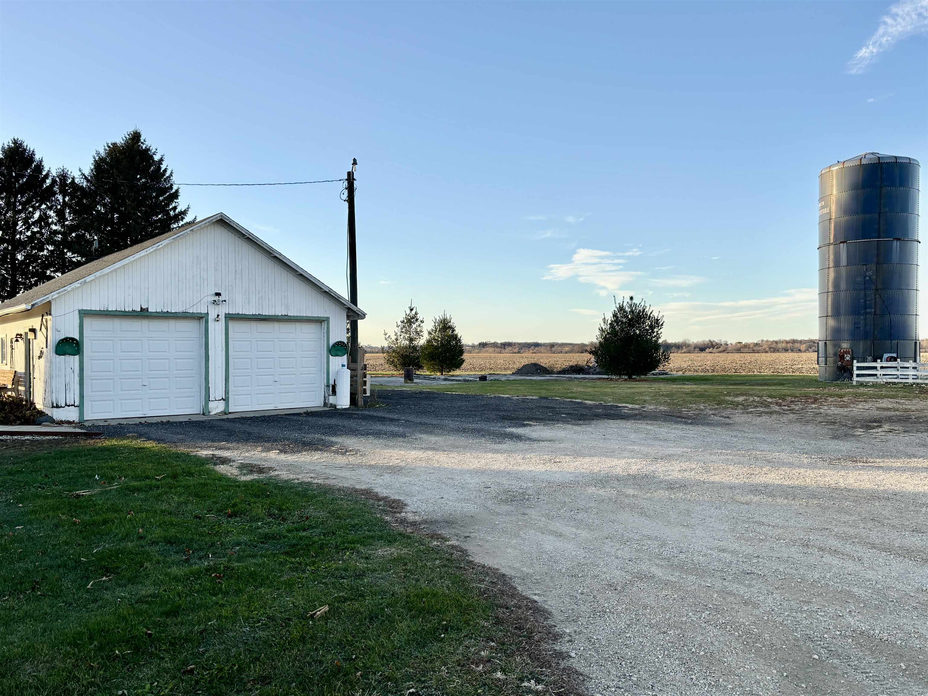 12916 Grange Hall Road Capron, IL 61012 - Photo 42 of 48 a view of a yard in front of a house