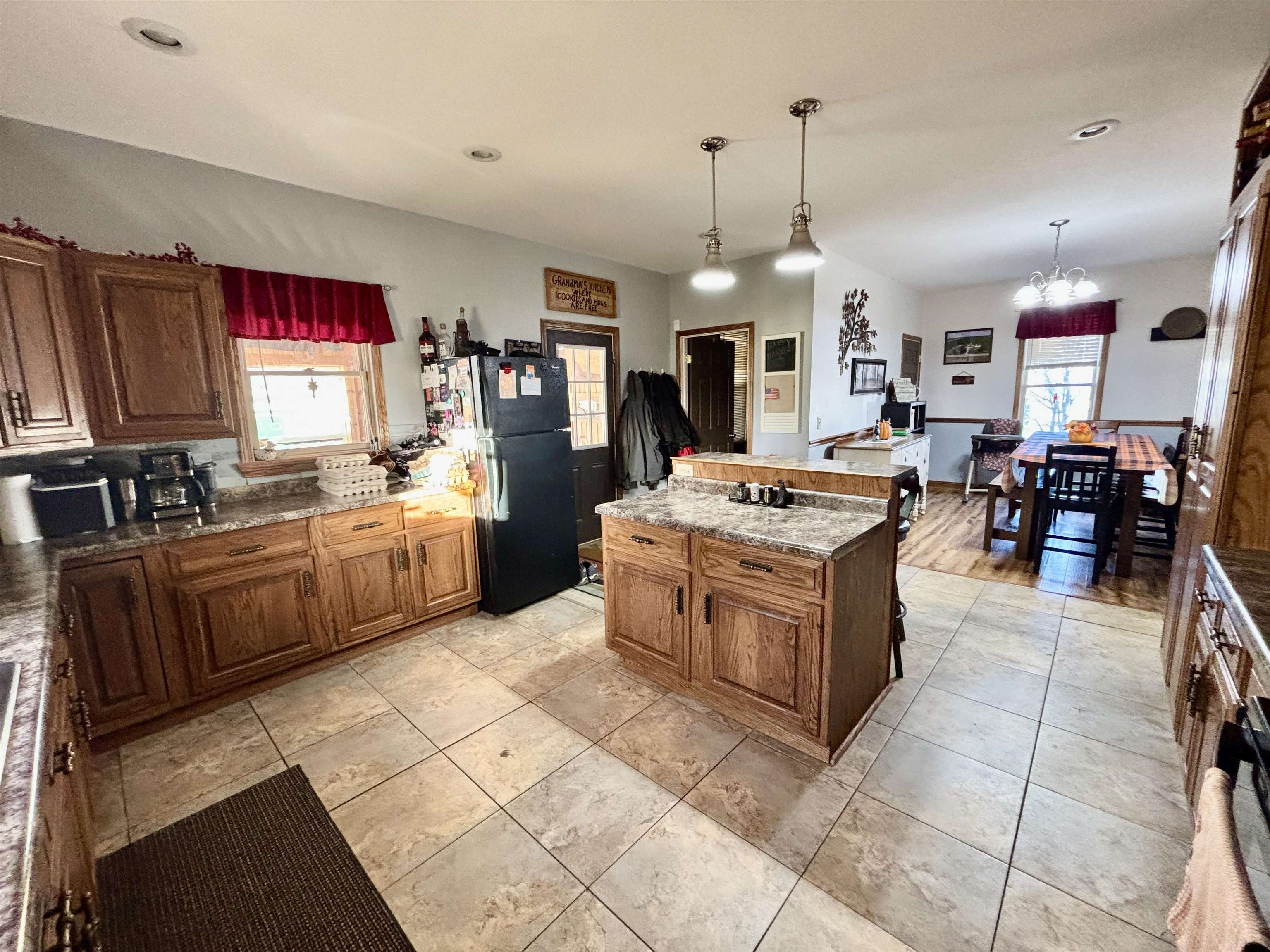 12916 Grange Hall Road Capron, IL 61012 - Photo 10 of 48 a large kitchen that has a lot of cabinets in it