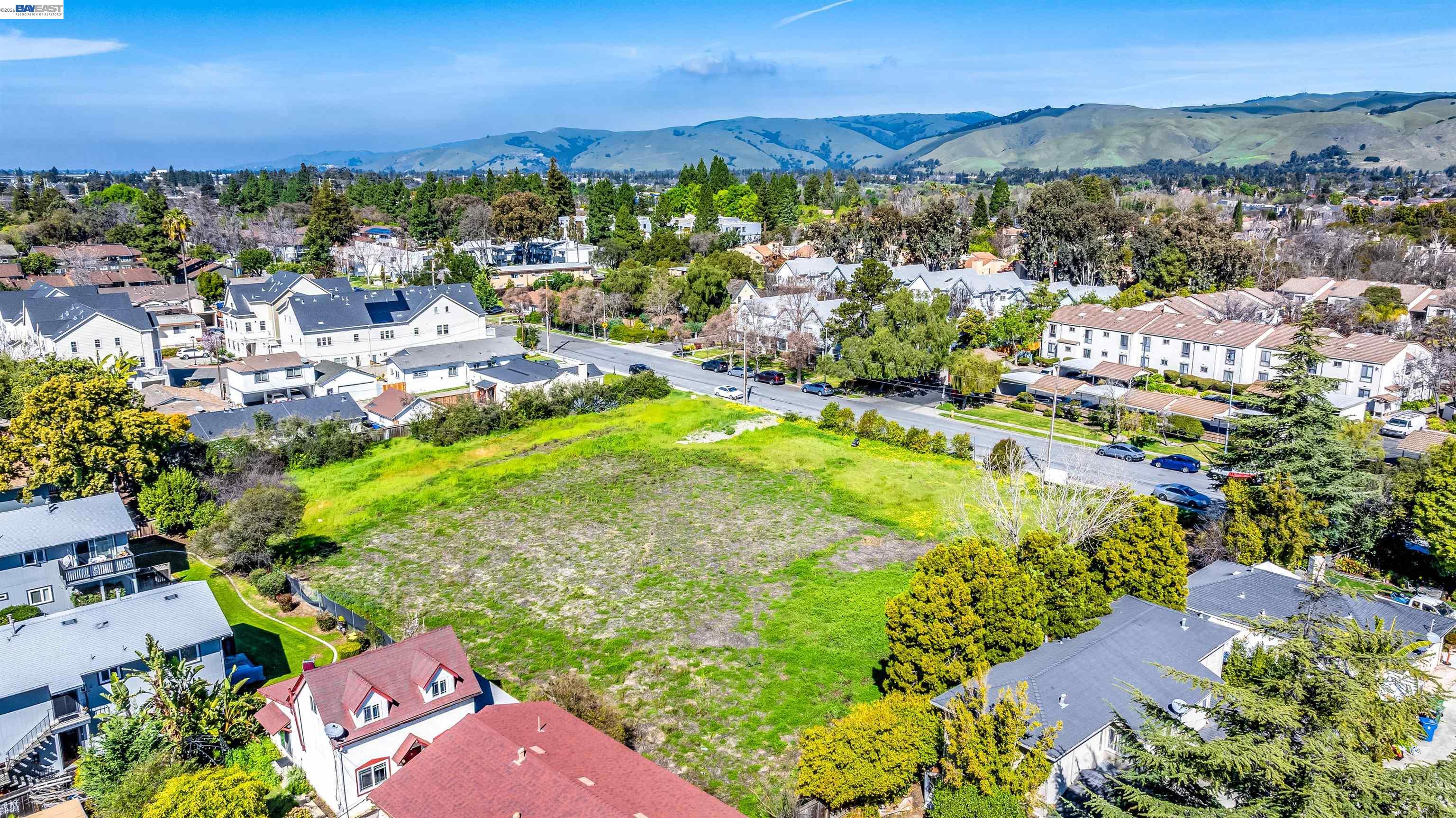 40871 High Street Fremont, CA 94538 - Photo 10 of 10 an aerial view of residential houses with outdoor space and trees all around