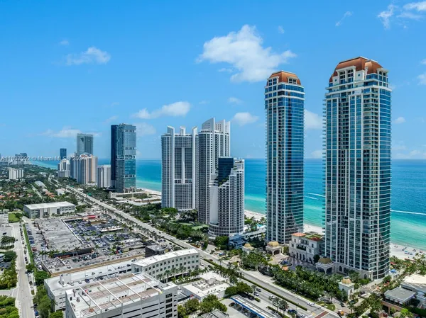 a view of a city with tall buildings