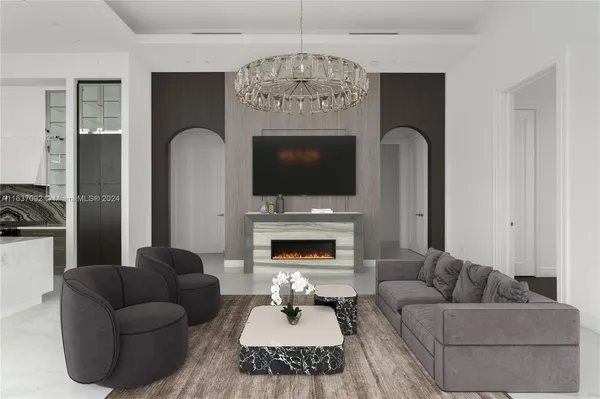 a living room with furniture and a painting on the wall