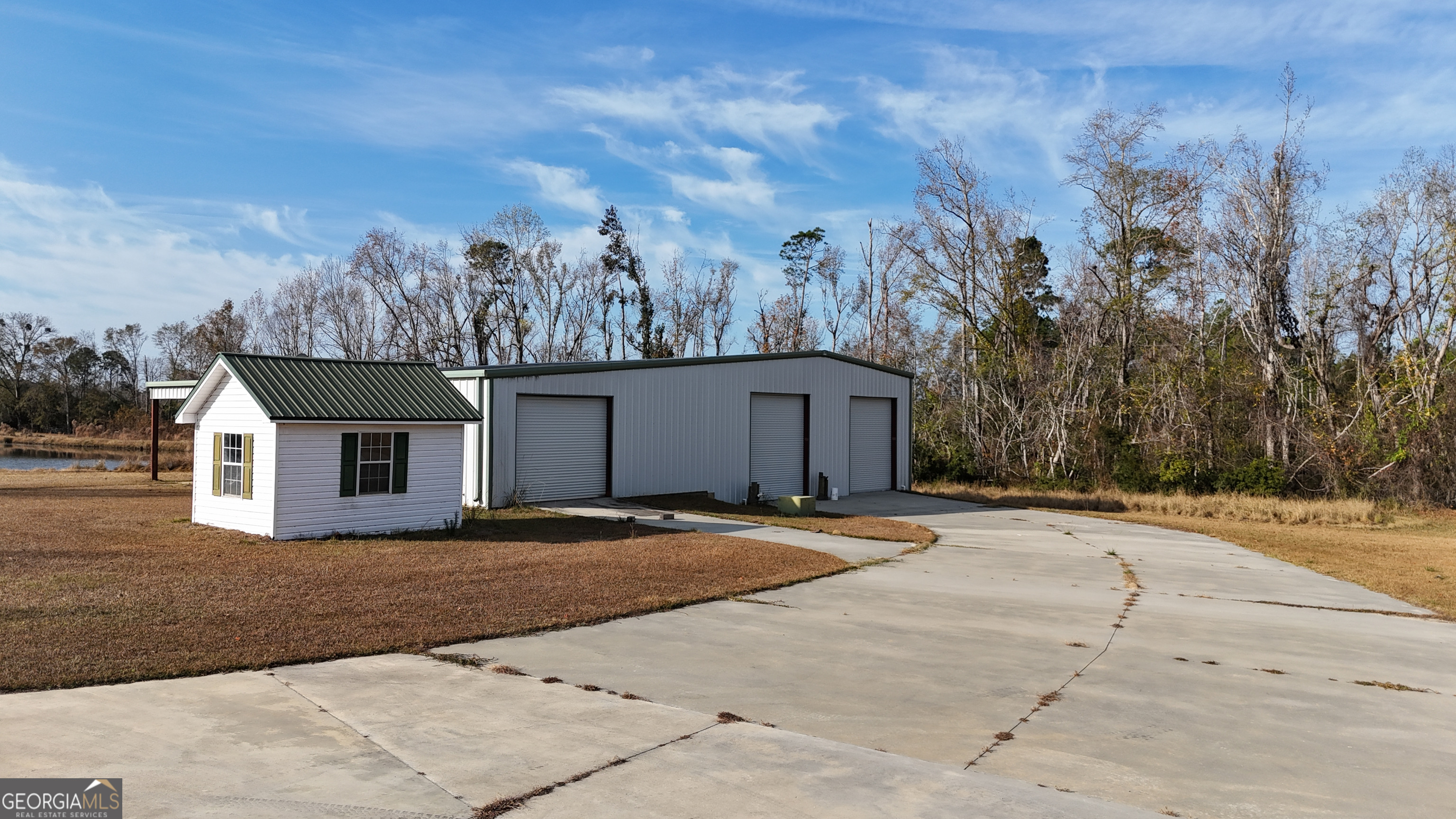 4262 Highway 15 Vidalia, GA 30474 - Photo 18 of 79 a view of a house with a yard