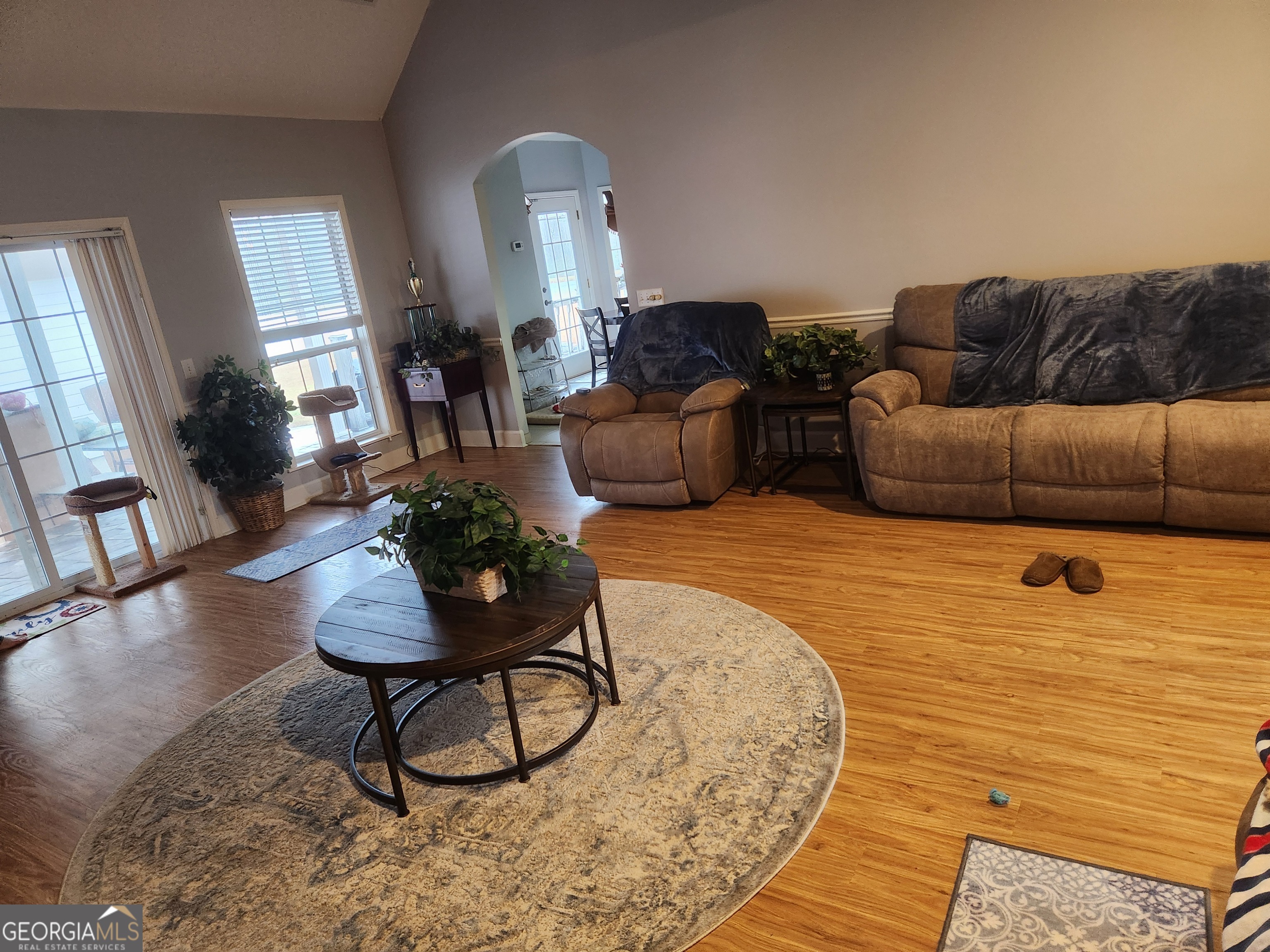 4262 Highway 15 Vidalia, GA 30474 - Photo 46 of 79 a living room with furniture and a wooden floor