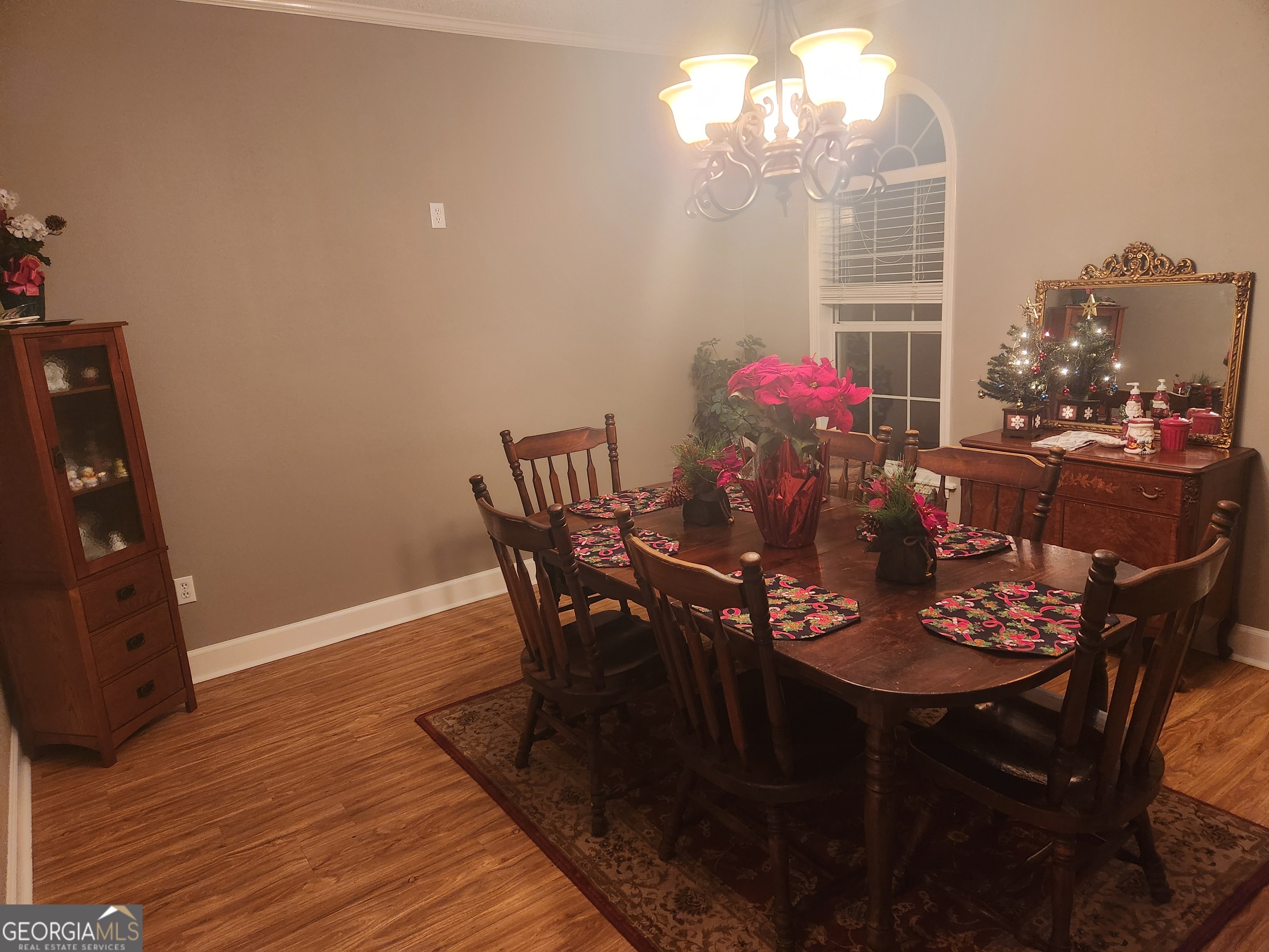 4262 Highway 15 Vidalia, GA 30474 - Photo 53 of 79 a view of a dining room with furniture and chandelier