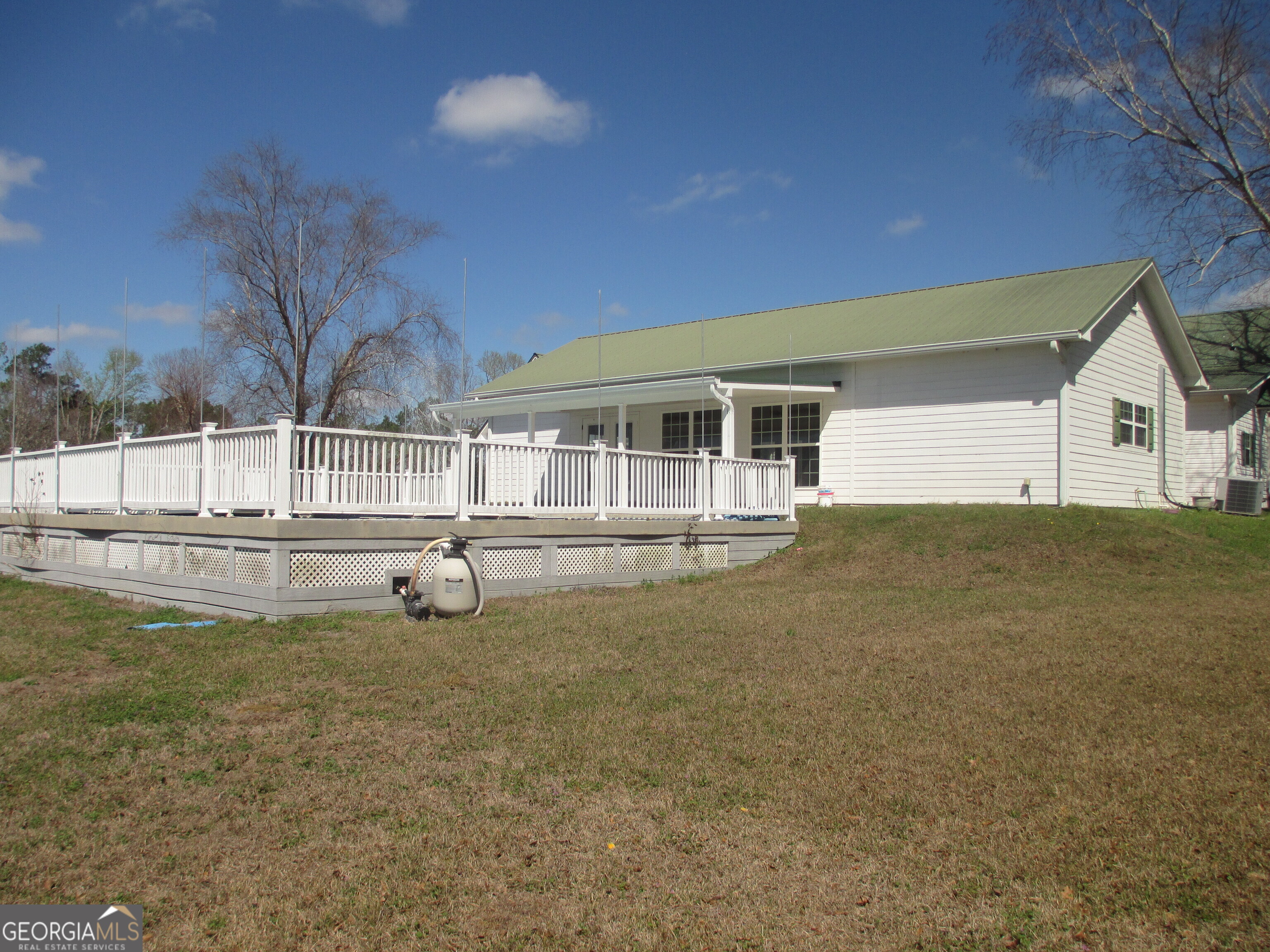 4262 Highway 15 Vidalia, GA 30474 - Photo 57 of 79 a house view with swimming pool in front of it