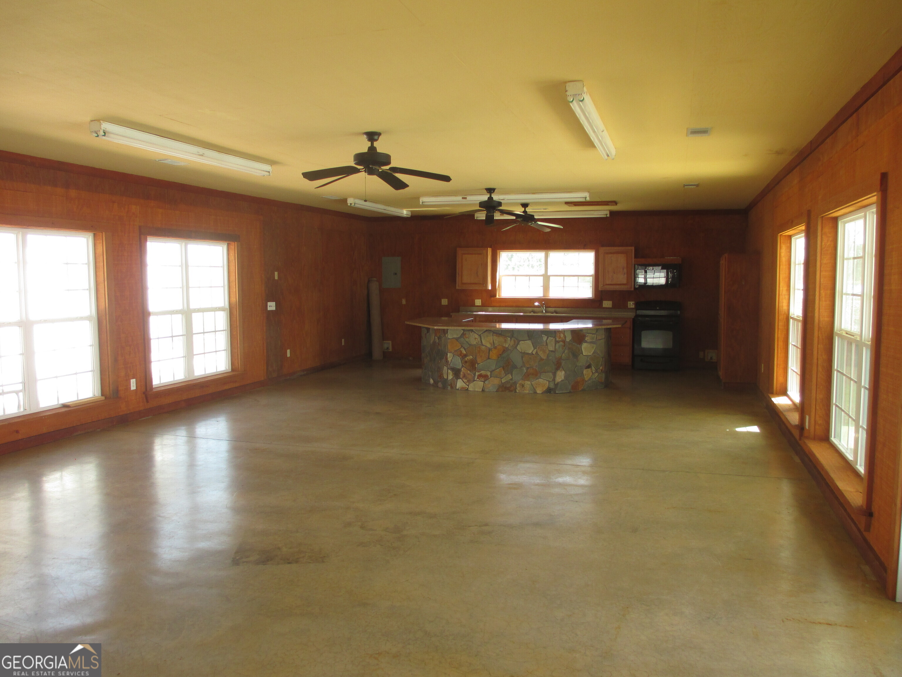 4262 Highway 15 Vidalia, GA 30474 - Photo 58 of 79 a view of a room with window and chandelier