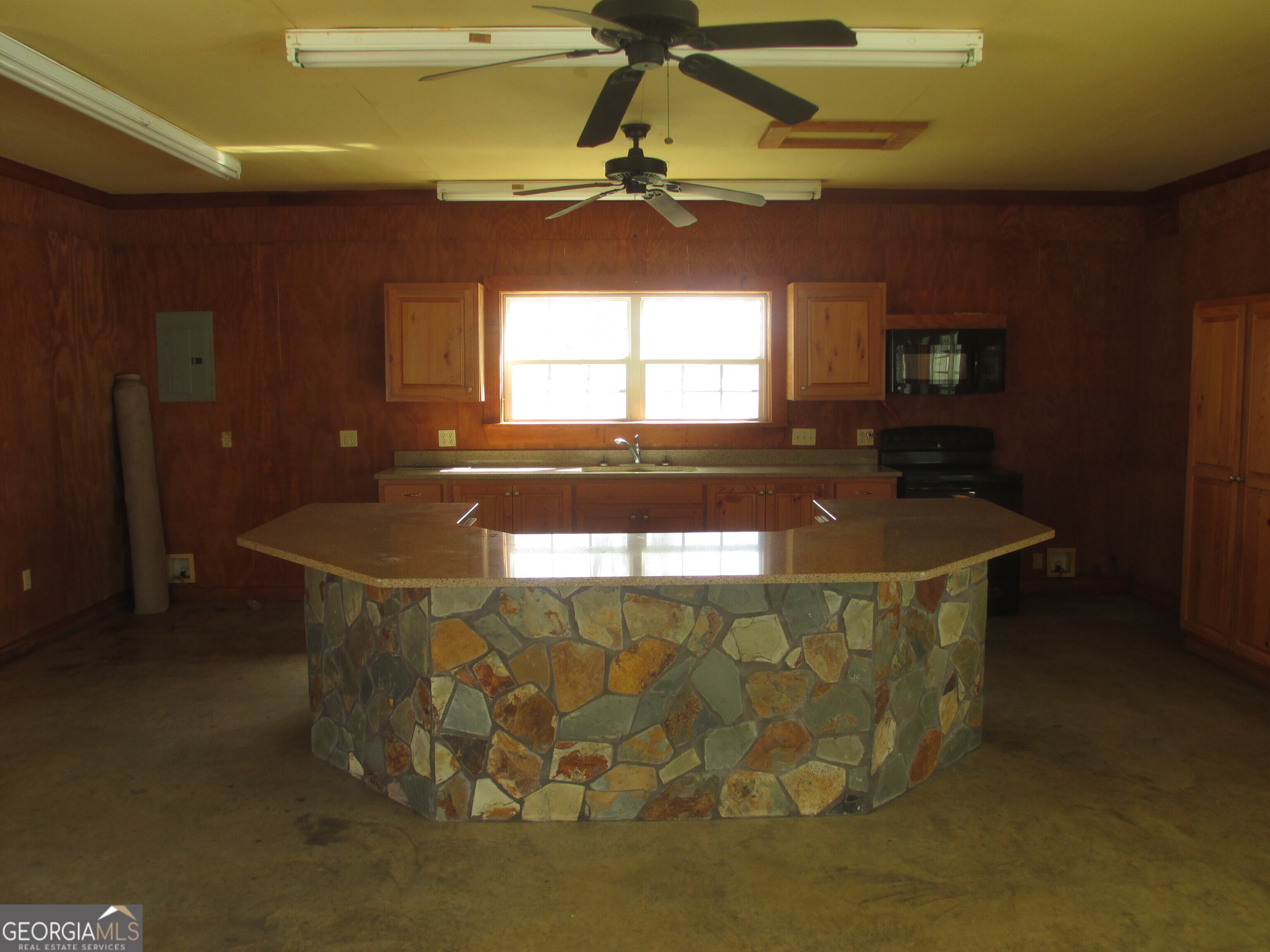 4262 Highway 15 Vidalia, GA 30474 - Photo 59 of 79 a front view of a house with a floor to ceiling window and chandelier