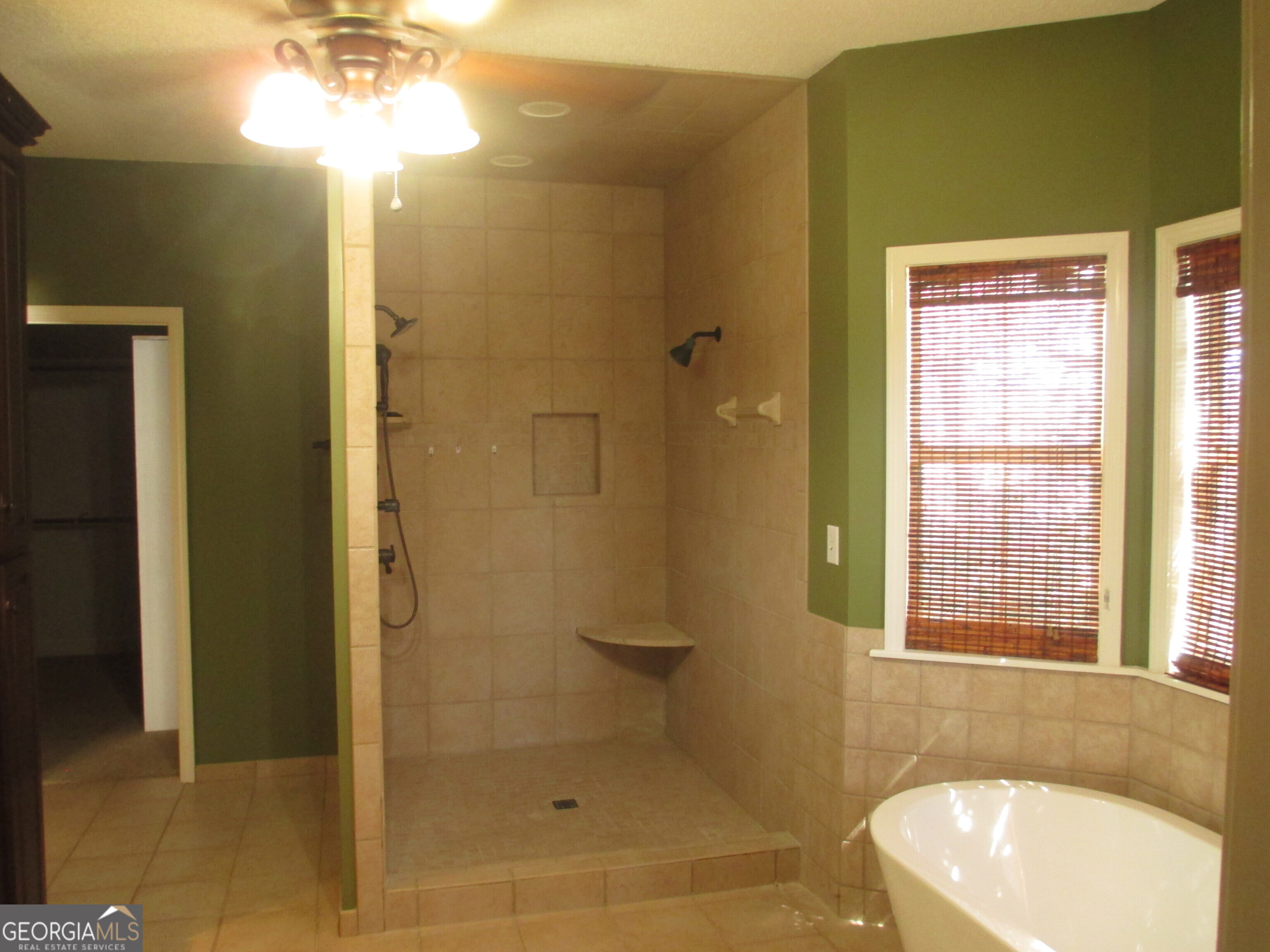 4262 Highway 15 Vidalia, GA 30474 - Photo 72 of 79 a bathroom with a bathtub and shower