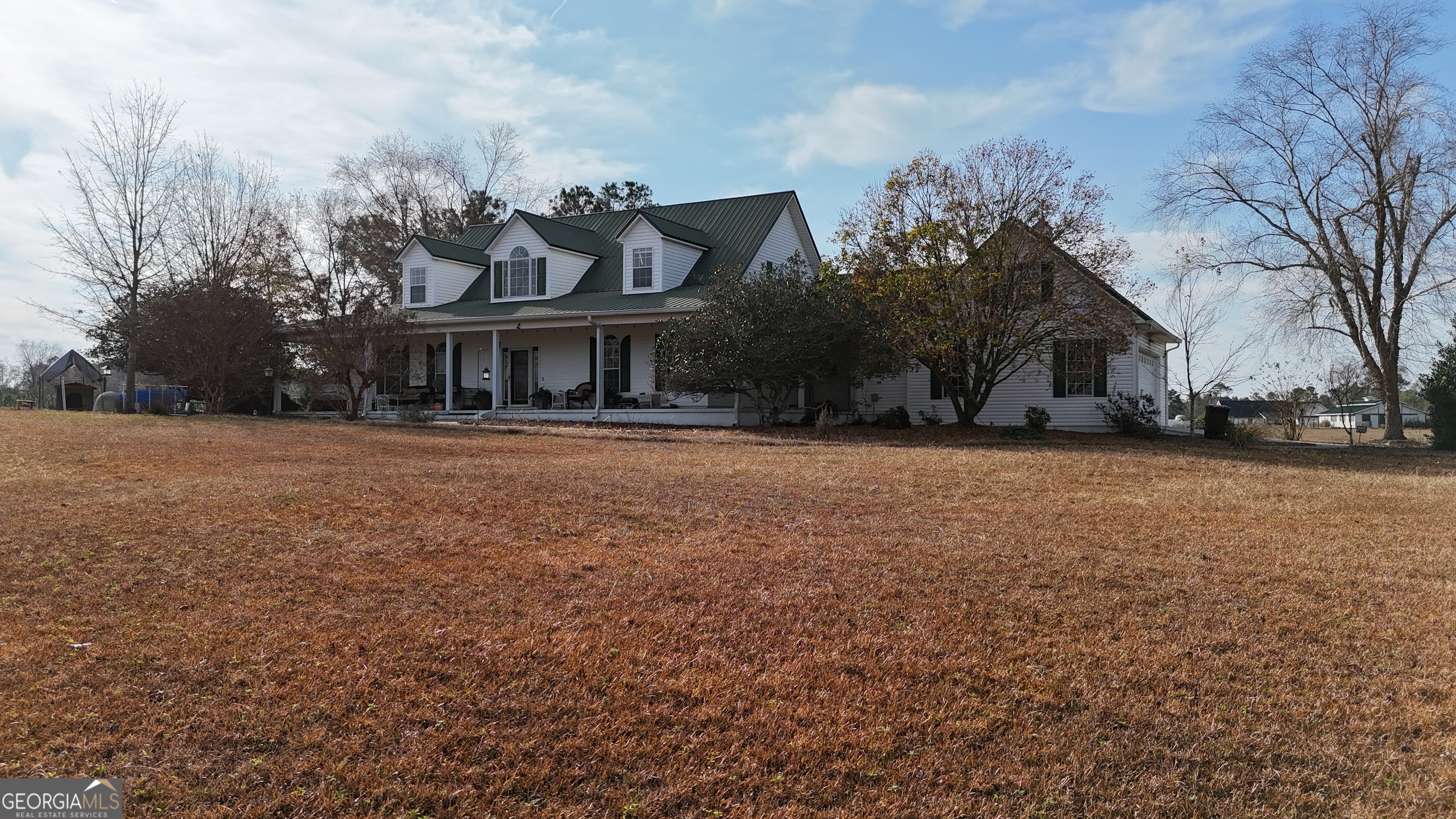 4262 Highway 15 Vidalia, GA 30474 - Photo 9 of 79 a front view of house with yard