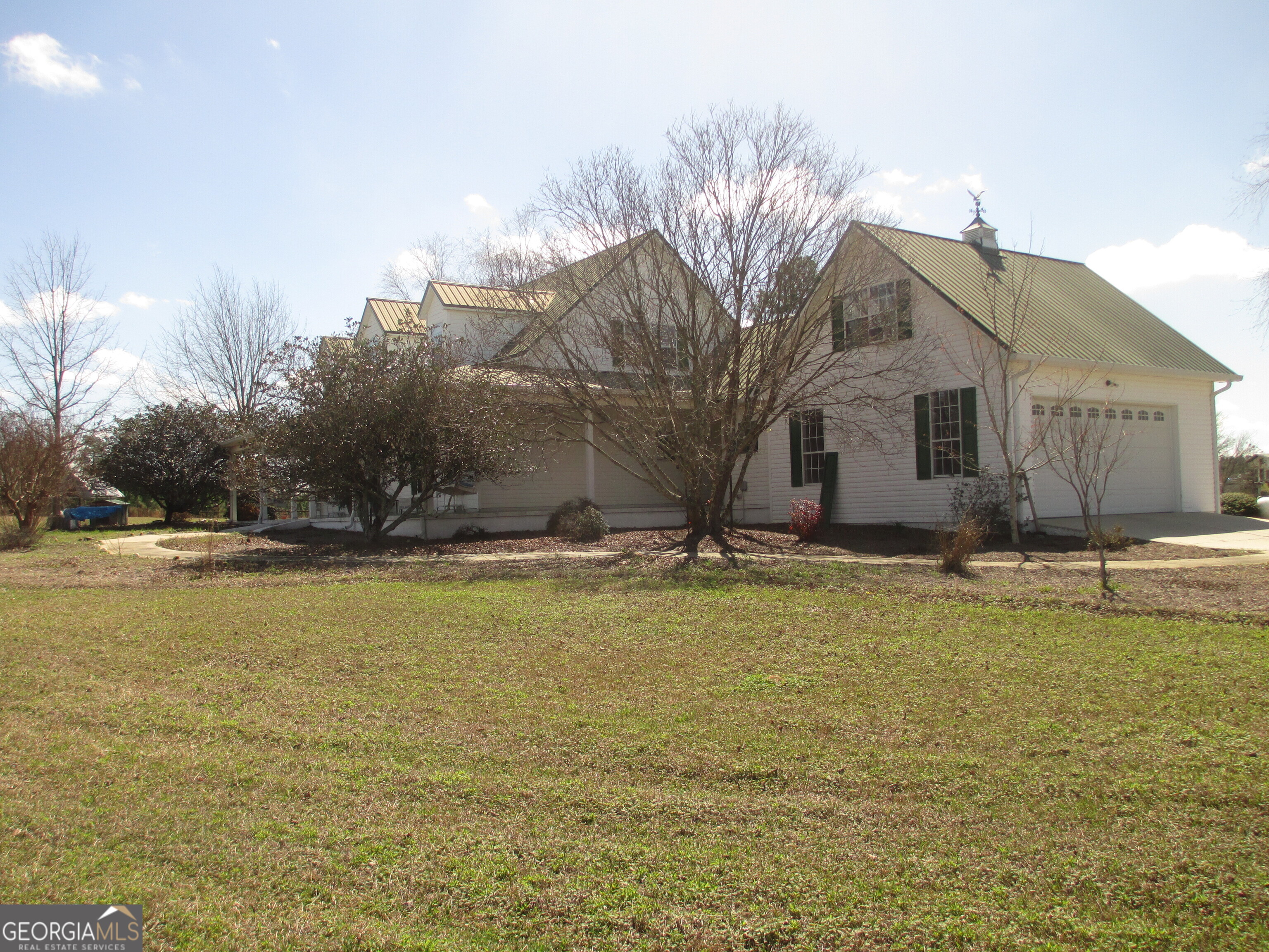 4262 Highway 15 Vidalia, GA 30474 - Photo 10 of 79 a swimming pool with outdoor seating and yard