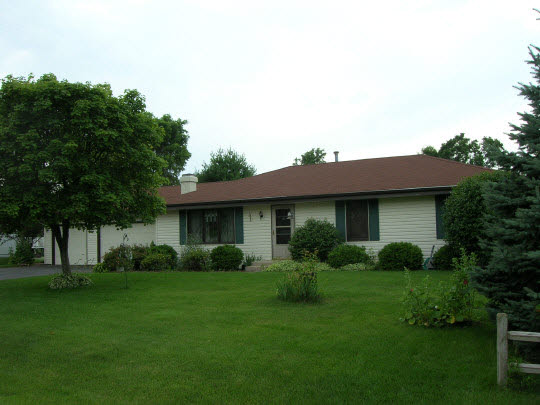 5851 Rural Edge Drive Roscoe, IL 61073 - Photo 1 of 5 a view of a yard in front of a house