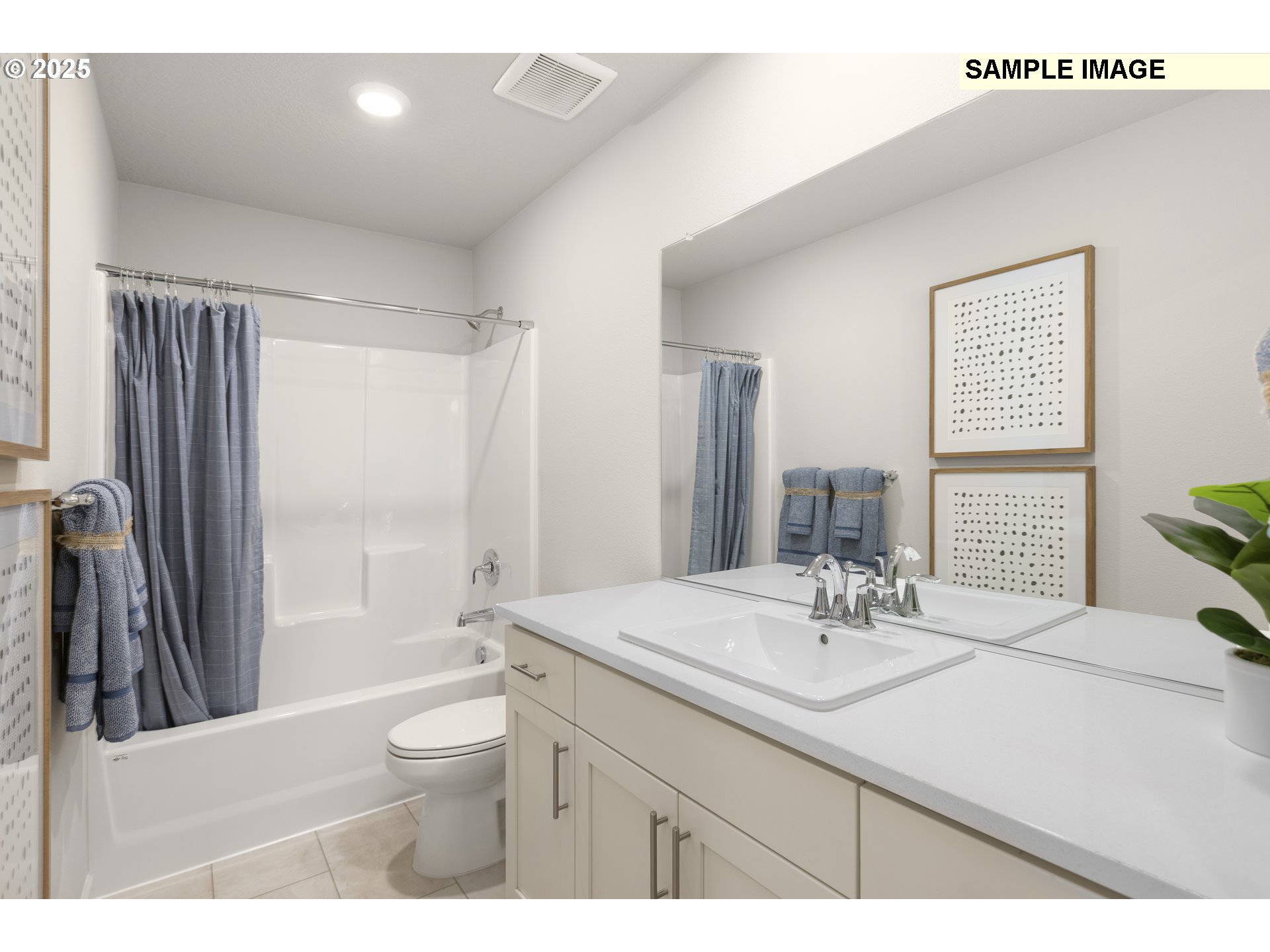 12239 Southwest Bittern Terrace Beaverton, OR 97007 - Photo 10 of 30 a bathroom with a double vanity sink toilet and shower