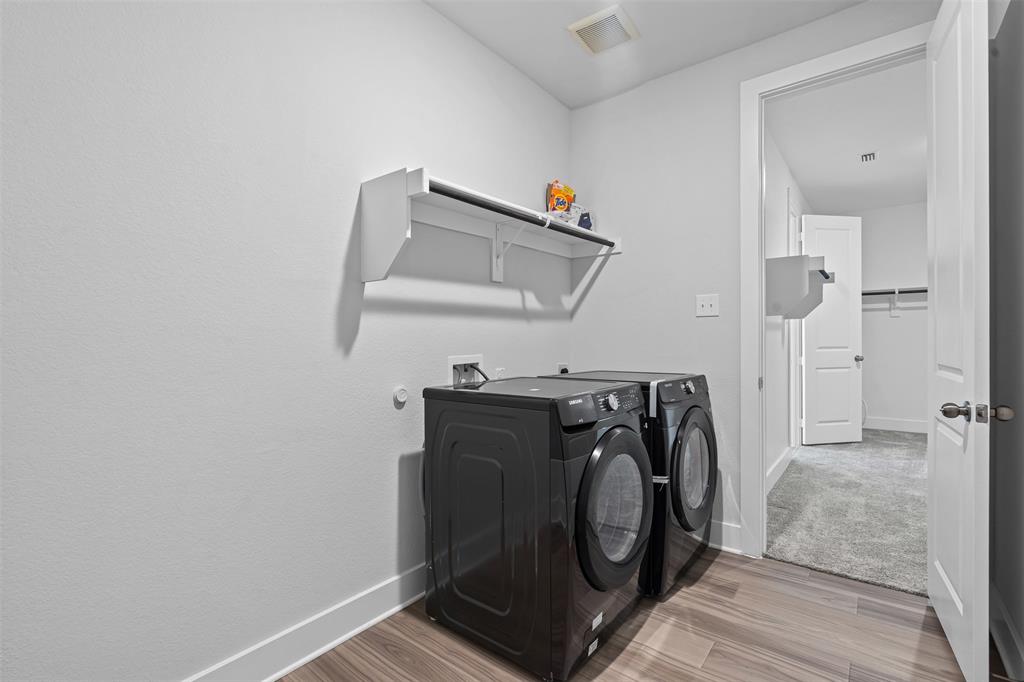 1770 English Way Waxahachie, TX 75165 - Photo 12 of 28 a utility room with dryer and washer