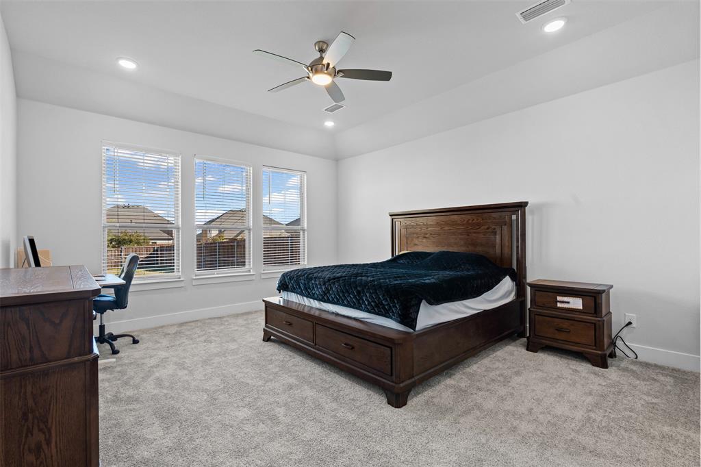 1770 English Way Waxahachie, TX 75165 - Photo 13 of 28 a bedroom with a bed and window