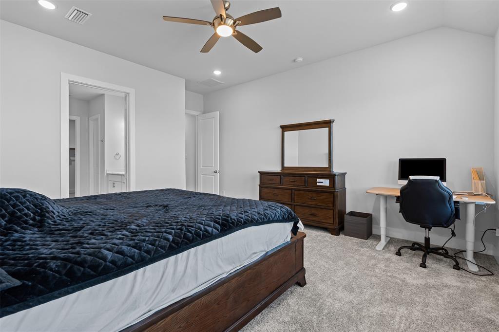 1770 English Way Waxahachie, TX 75165 - Photo 15 of 28 a bedroom with a bed and a chair