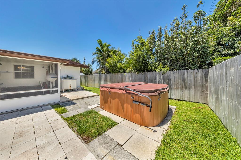 3213 Dover Road Pompano Beach, FL 33062 - Photo 13 of 53 a view of a backyard with open kitchen