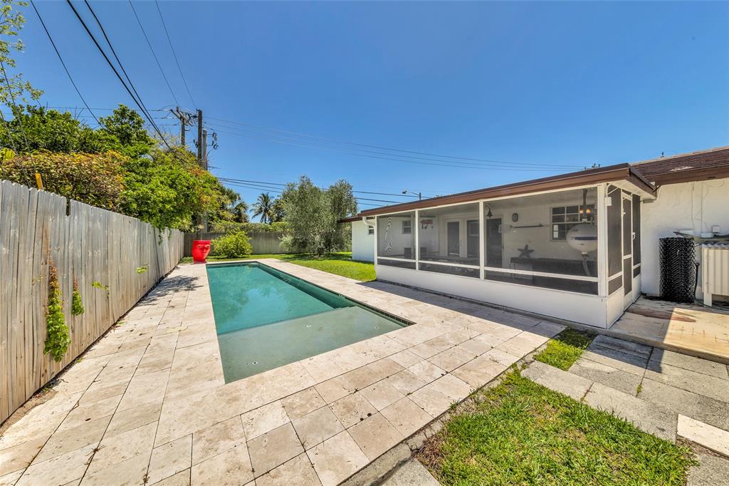 3213 Dover Road Pompano Beach, FL 33062 - Photo 14 of 53 a view of a house with backyard and sitting area