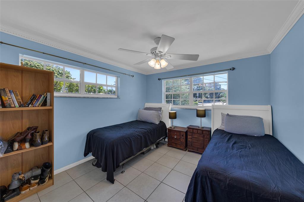 3213 Dover Road Pompano Beach, FL 33062 - Photo 19 of 53 a living room with furniture and a window