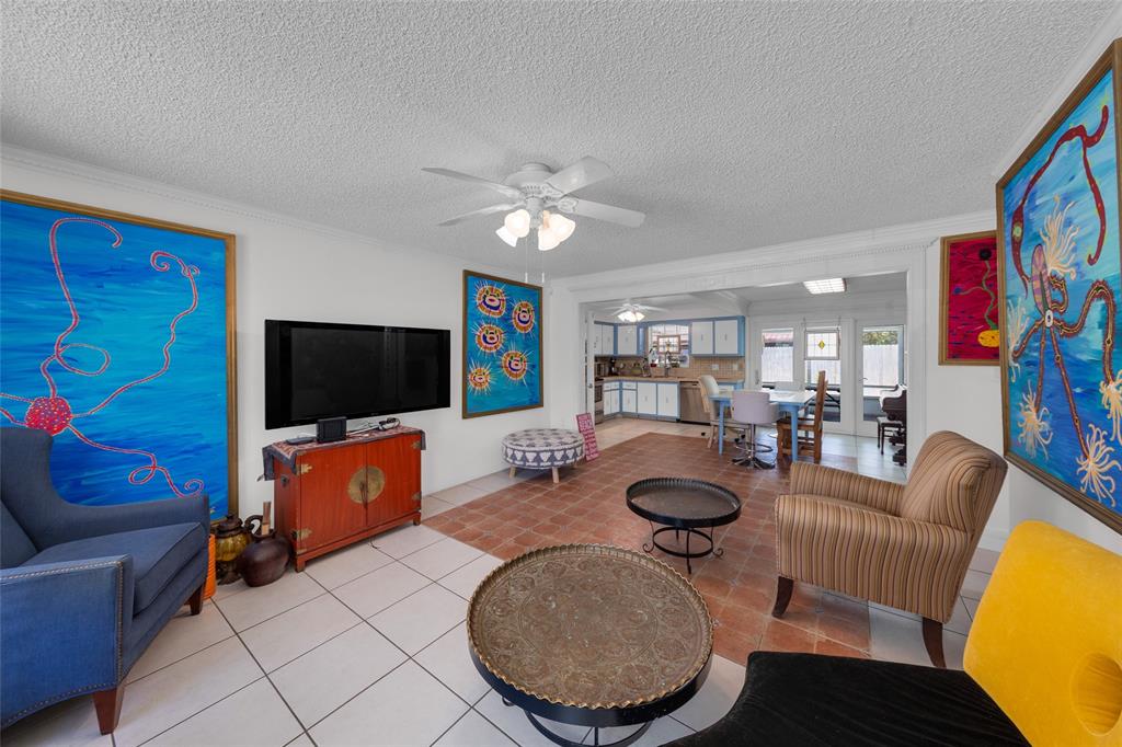 3213 Dover Road Pompano Beach, FL 33062 - Photo 29 of 53 a living room with furniture and a flat screen tv