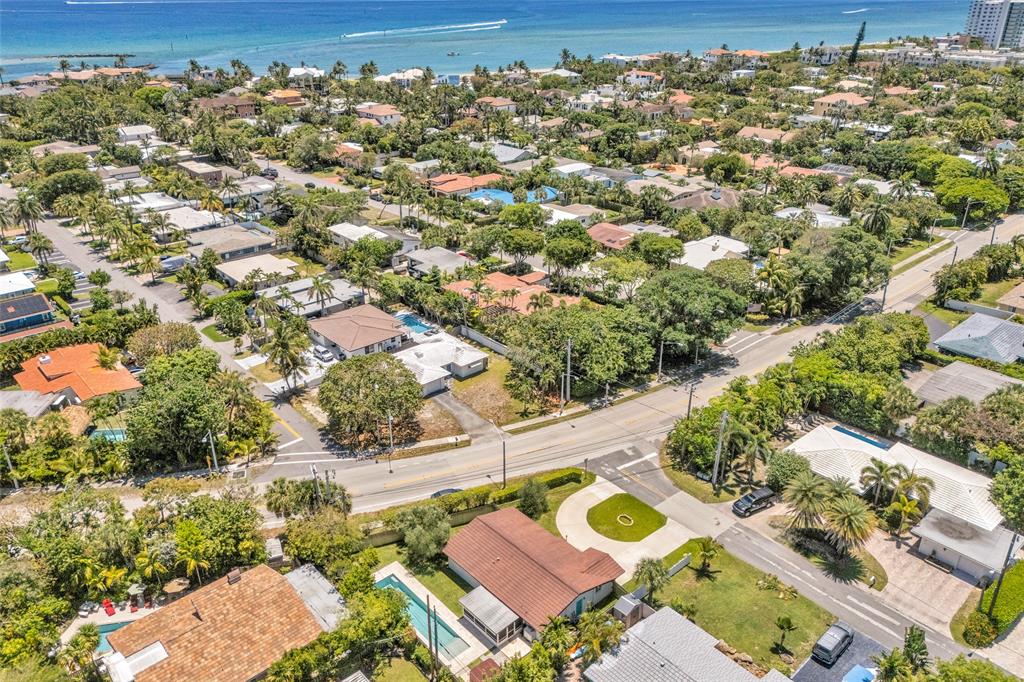 3213 Dover Road Pompano Beach, FL 33062 - Photo 49 of 53 an aerial view of residential houses with outdoor space