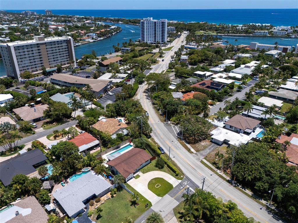 3213 Dover Road Pompano Beach, FL 33062 - Photo 51 of 53 an aerial view of residential houses with city view