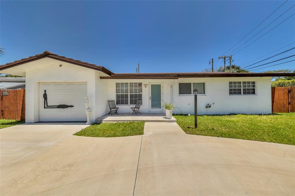 3213 Dover Road Pompano Beach, FL 33062 - Photo 6 of 53 a view of outdoor space yard and garage