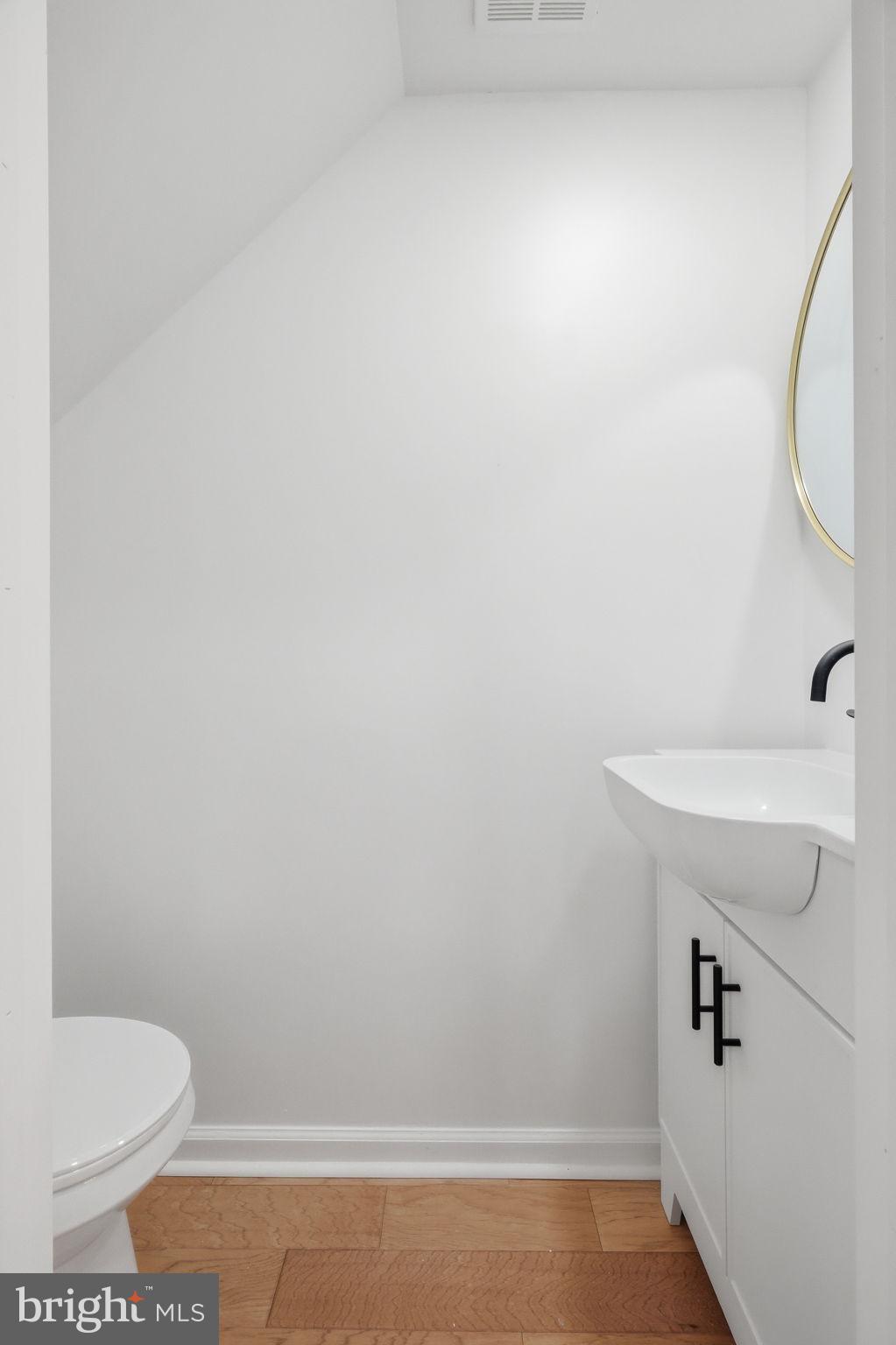 7413 Sommers Road Philadelphia, PA 19138 - Photo 16 of 54 a bathroom with a toilet and a sink