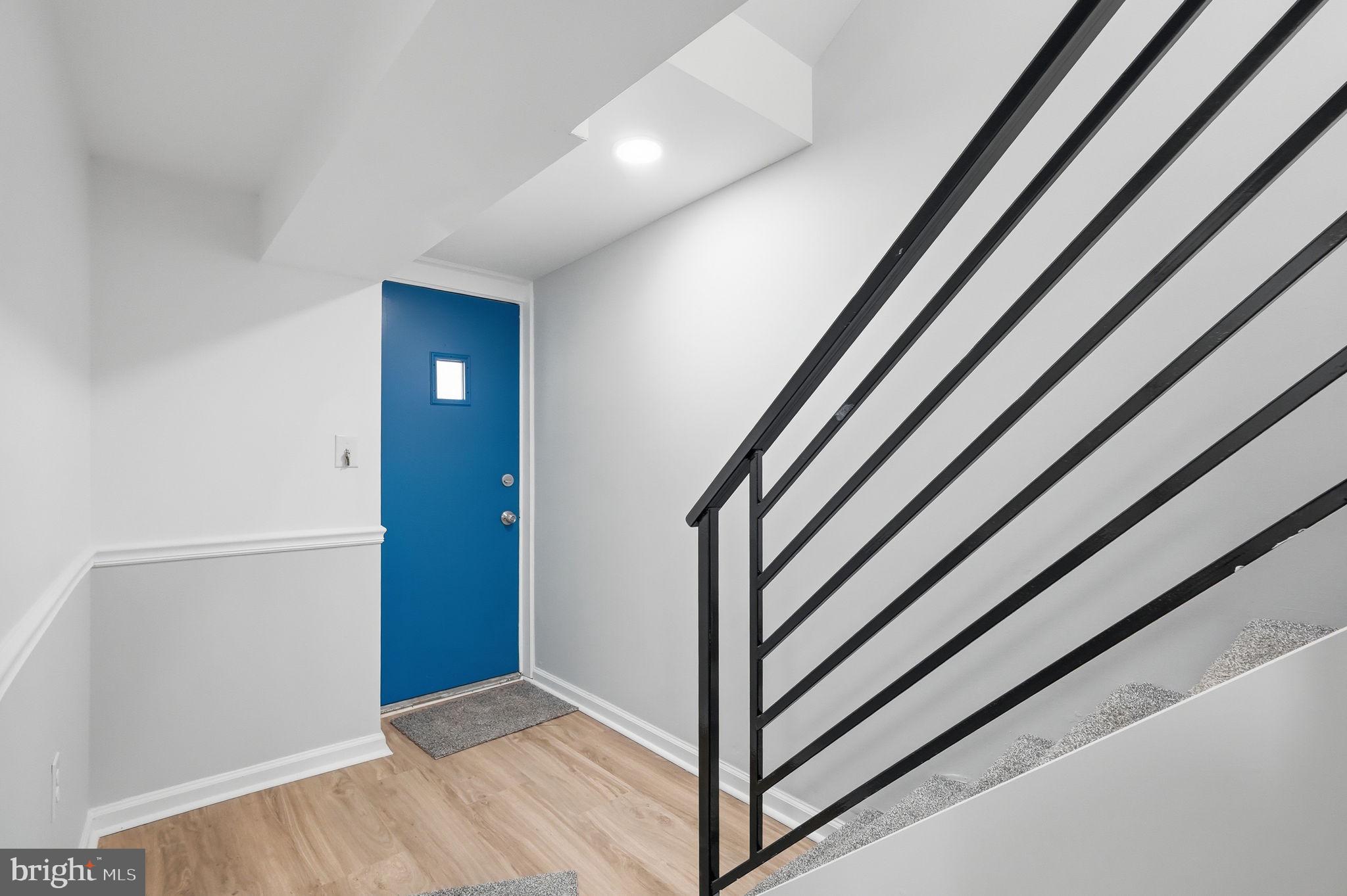 7413 Sommers Road Philadelphia, PA 19138 - Photo 19 of 54 a view of staircase with white walls and a window