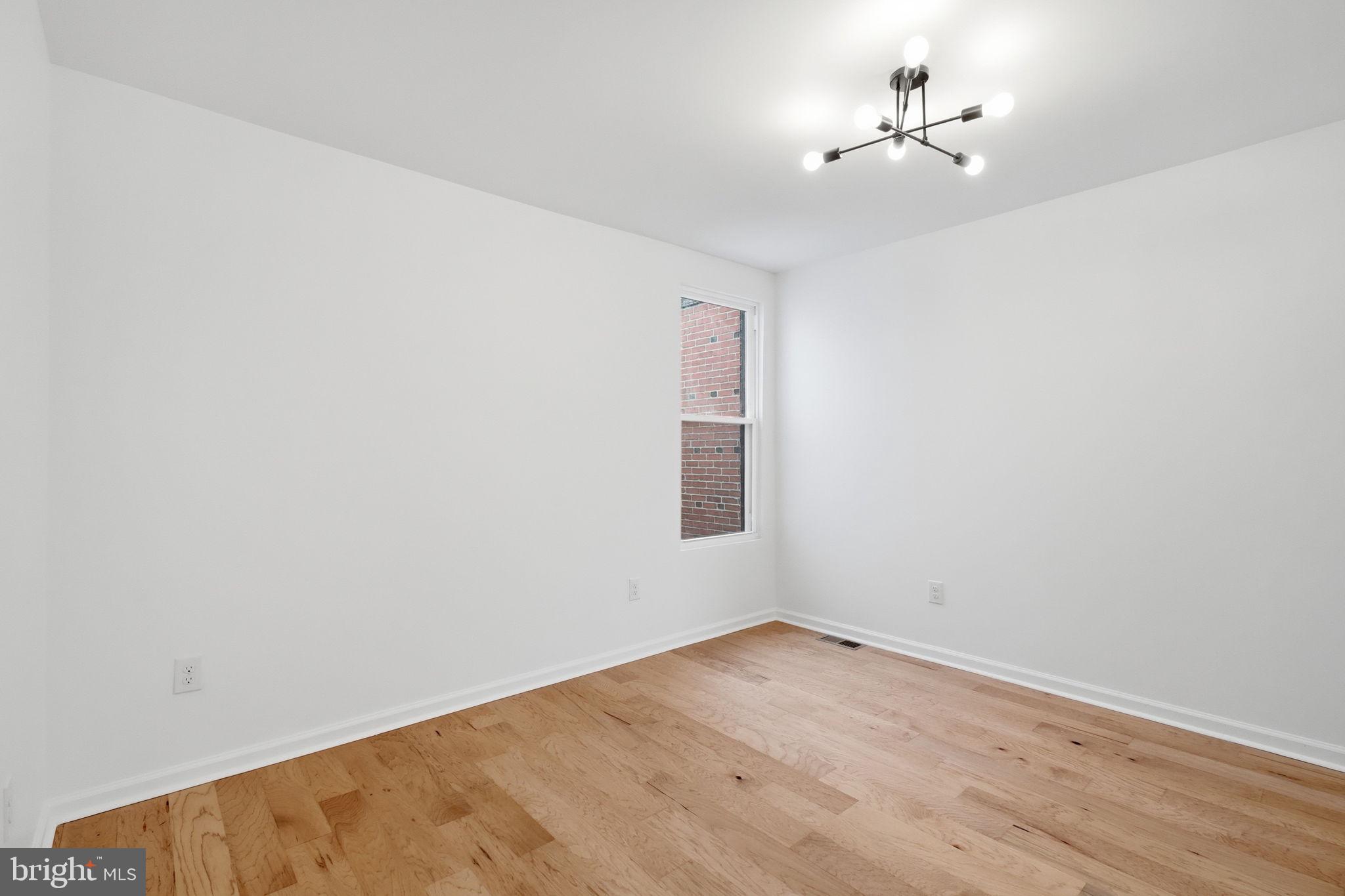 7413 Sommers Road Philadelphia, PA 19138 - Photo 39 of 54 wooden floor in an empty room