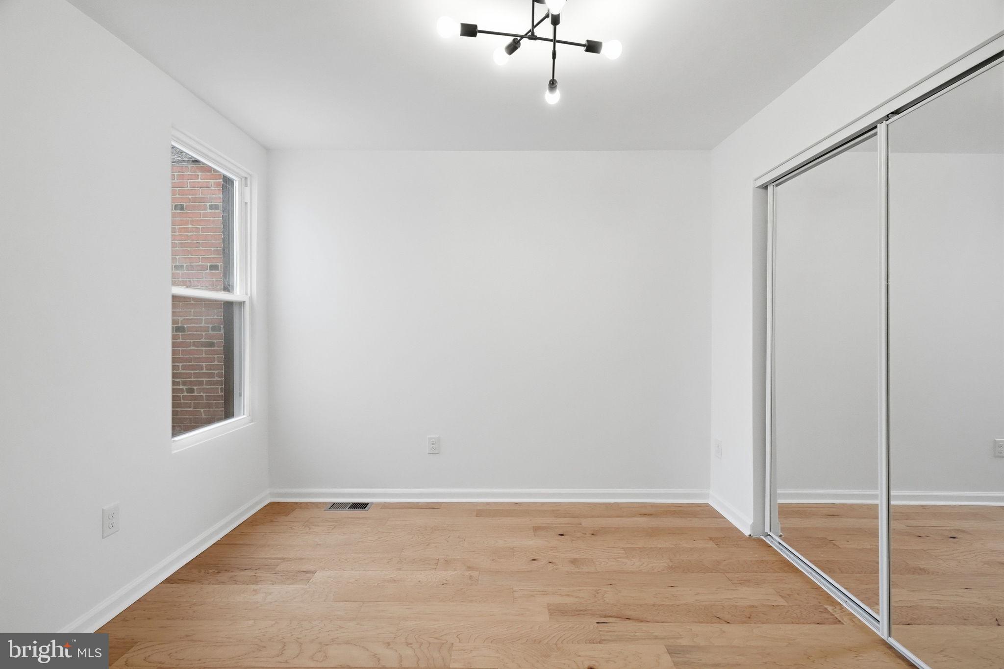 7413 Sommers Road Philadelphia, PA 19138 - Photo 40 of 54 a view of an empty room with windows