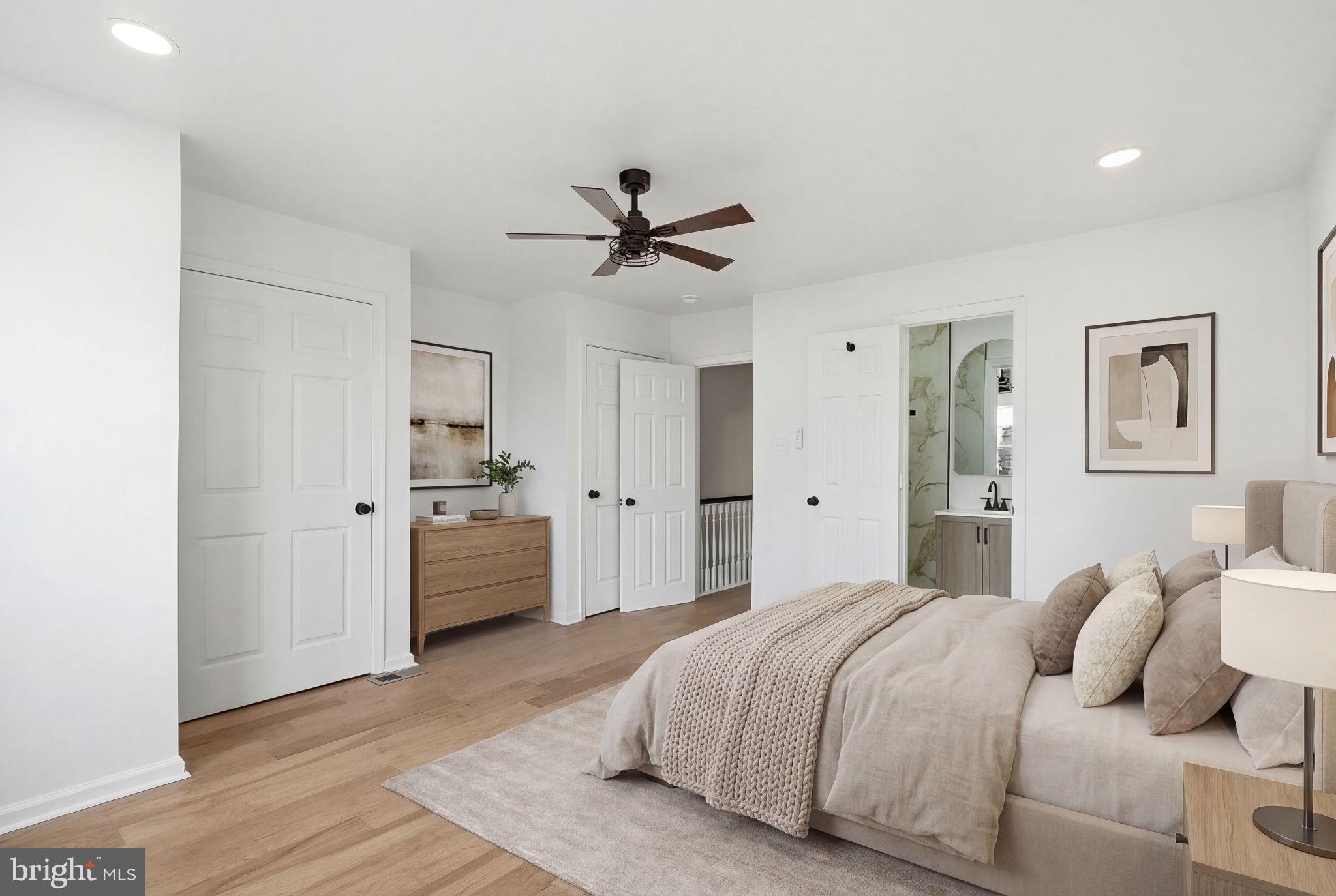 7413 Sommers Road Philadelphia, PA 19138 - Photo 46 of 54 a spacious bedroom with a bed and cabinets