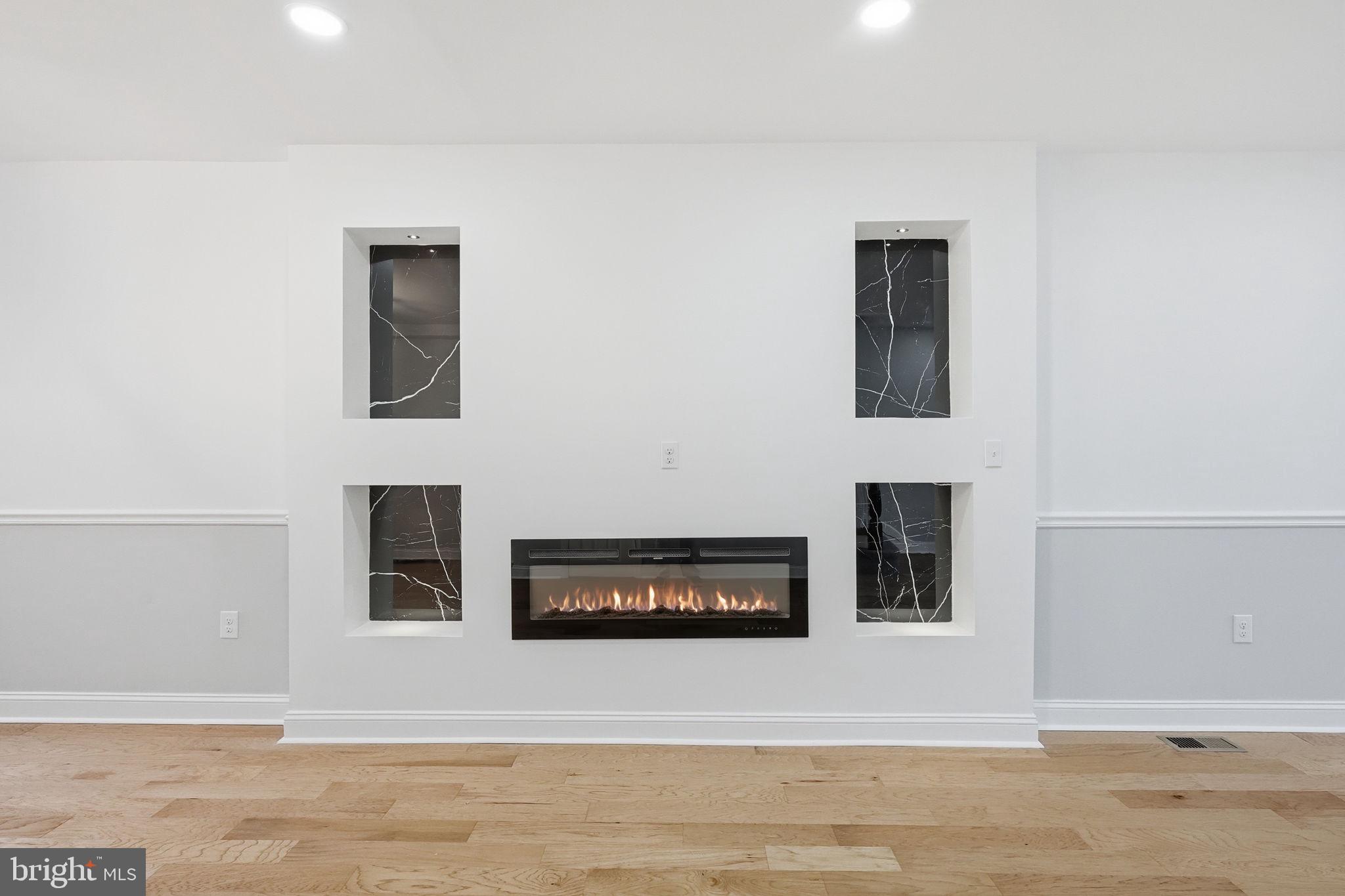 7413 Sommers Road Philadelphia, PA 19138 - Photo 8 of 54 a living room with furniture and a fireplace