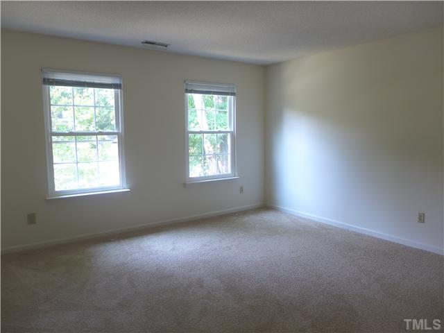 534 Bluestone Road Durham, NC 27713 - Photo 16 of 25 Bedroom 4 is Huge! Could easily be used as a Bonus Room! Features New Carpet and 2 Windows!