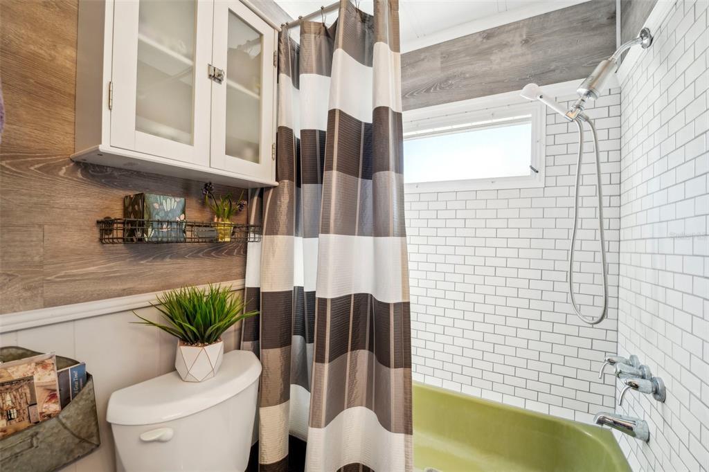 1600 Old Coachman Rd., Unit 709 Clearwater, FL 33765 - Photo 15 of 23 a bathroom with a sink toilet and shower