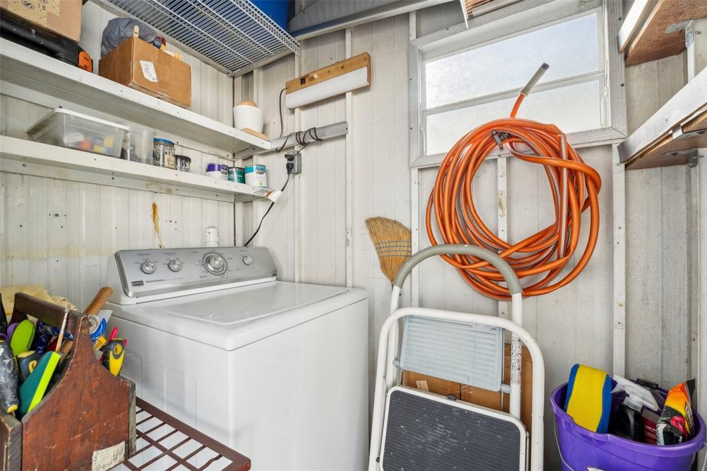 1600 Old Coachman Rd., Unit 709 Clearwater, FL 33765 - Photo 19 of 23 a utility room with dryer and washer
