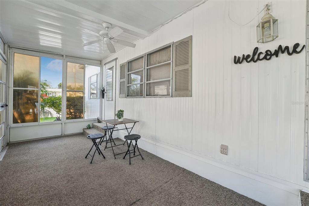 1600 Old Coachman Rd., Unit 709 Clearwater, FL 33765 - Photo 2 of 23 a work room with furniture and windows