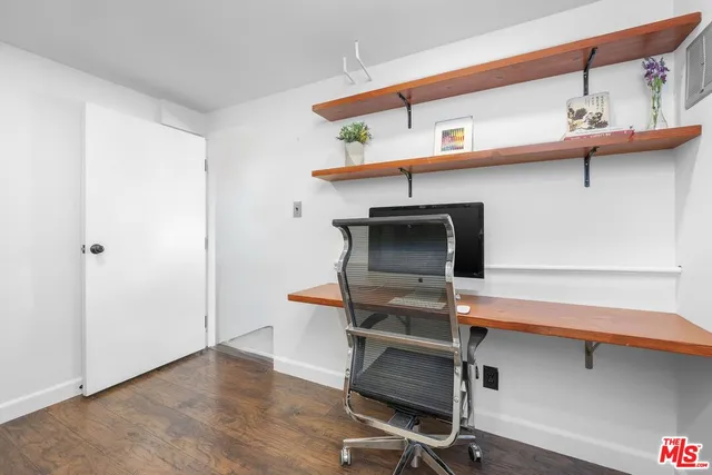 a room with furniture and a window