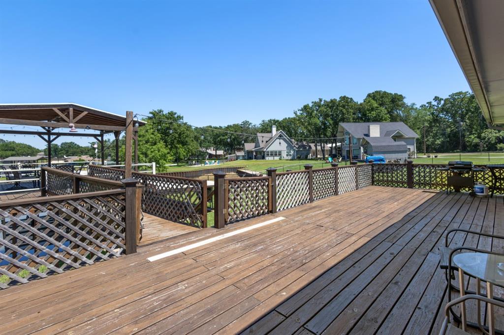 227 Scenic Road Trinidad, TX 75163 - Photo 27 of 40 a view of a roof deck with couches