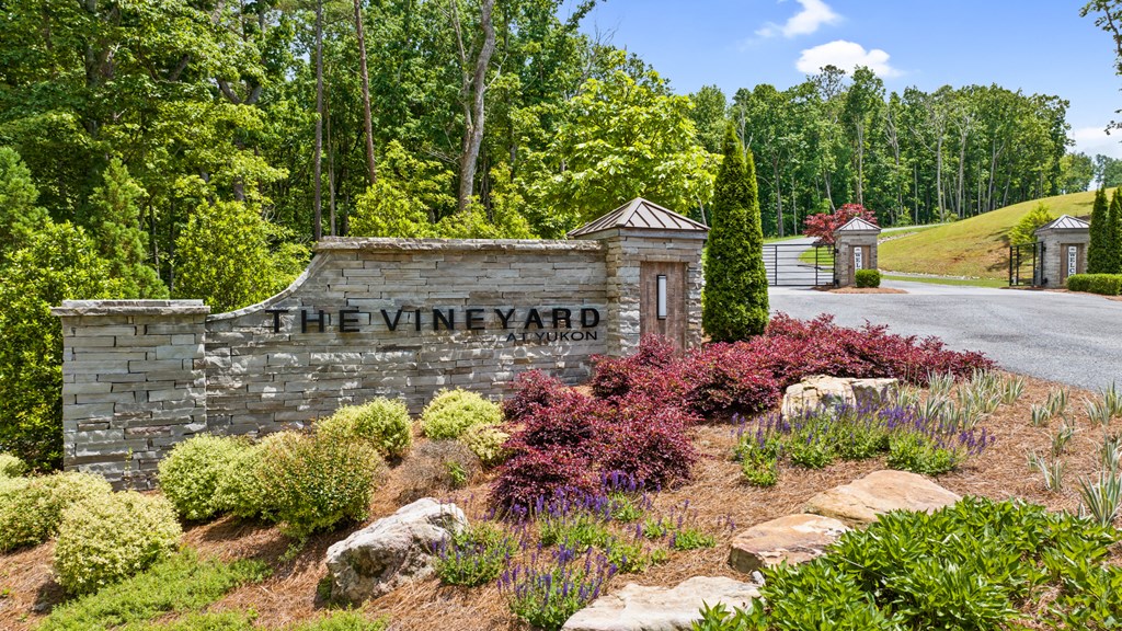 Lot 105 Twisted Oak Road Talking Rock, GA 30175 - Photo 15 of 15 a view of a house with a yard and garden