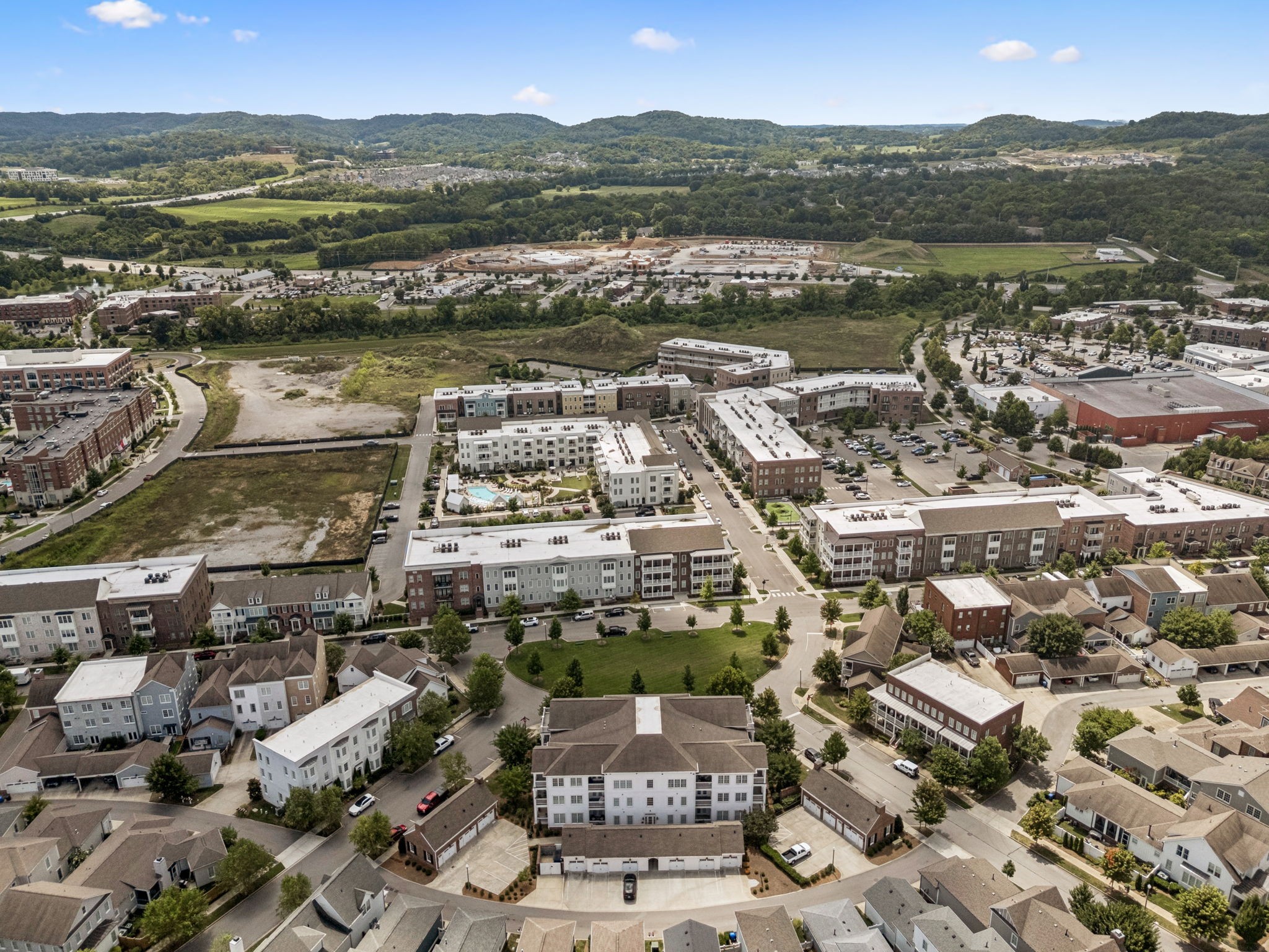 201 Swain Circle, Unit 104 Franklin, TN 37064 - Photo 25 of 45 an aerial view of residential building with outdoor space lake and green space