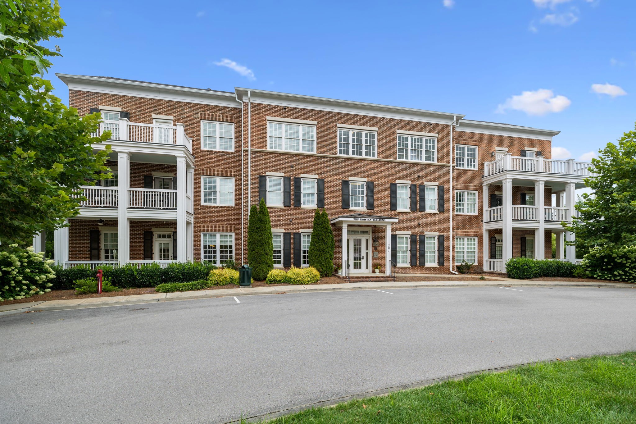 201 Swain Circle, Unit 104 Franklin, TN 37064 - Photo 45 of 45 a front view of a building with street view