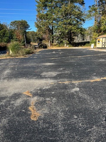 123-125 Mendon Street Bellingham, MA 02019 - Photo 3 of 7 a big yard with road