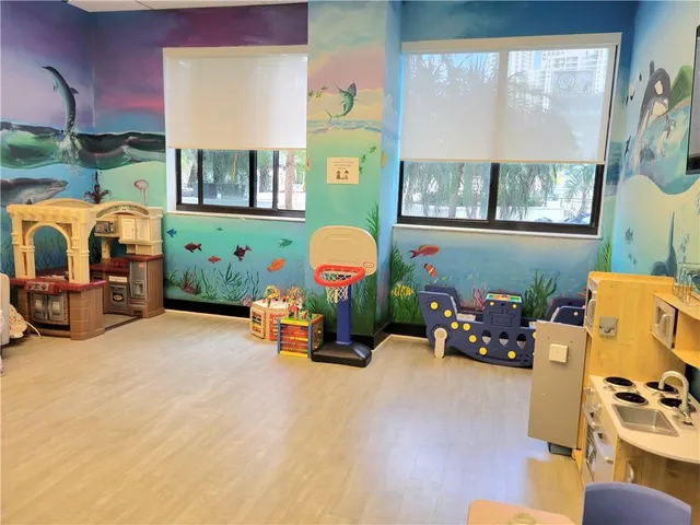 an outdoor space with patio furniture and a window